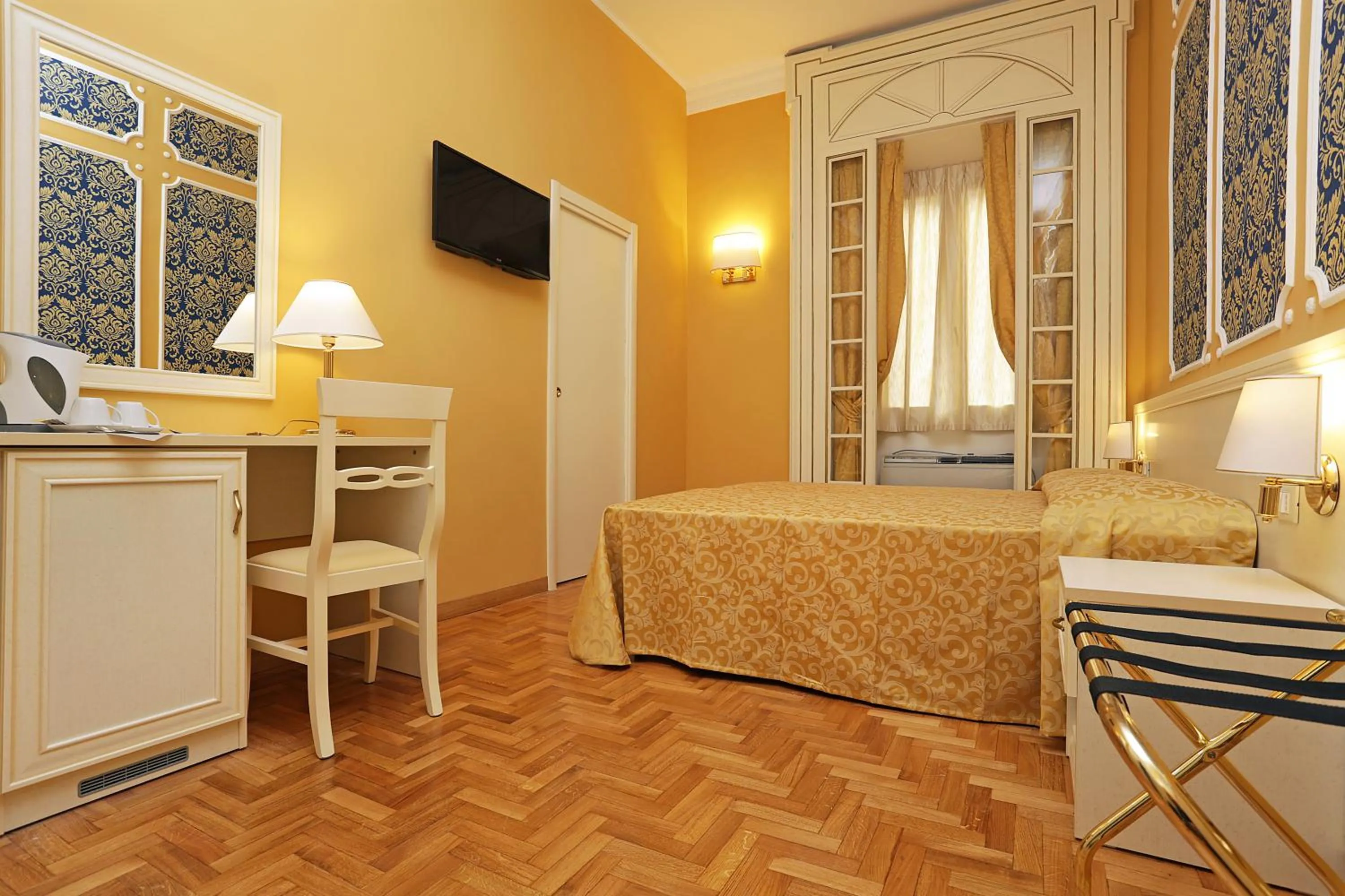 Bed in DG Prestige Room