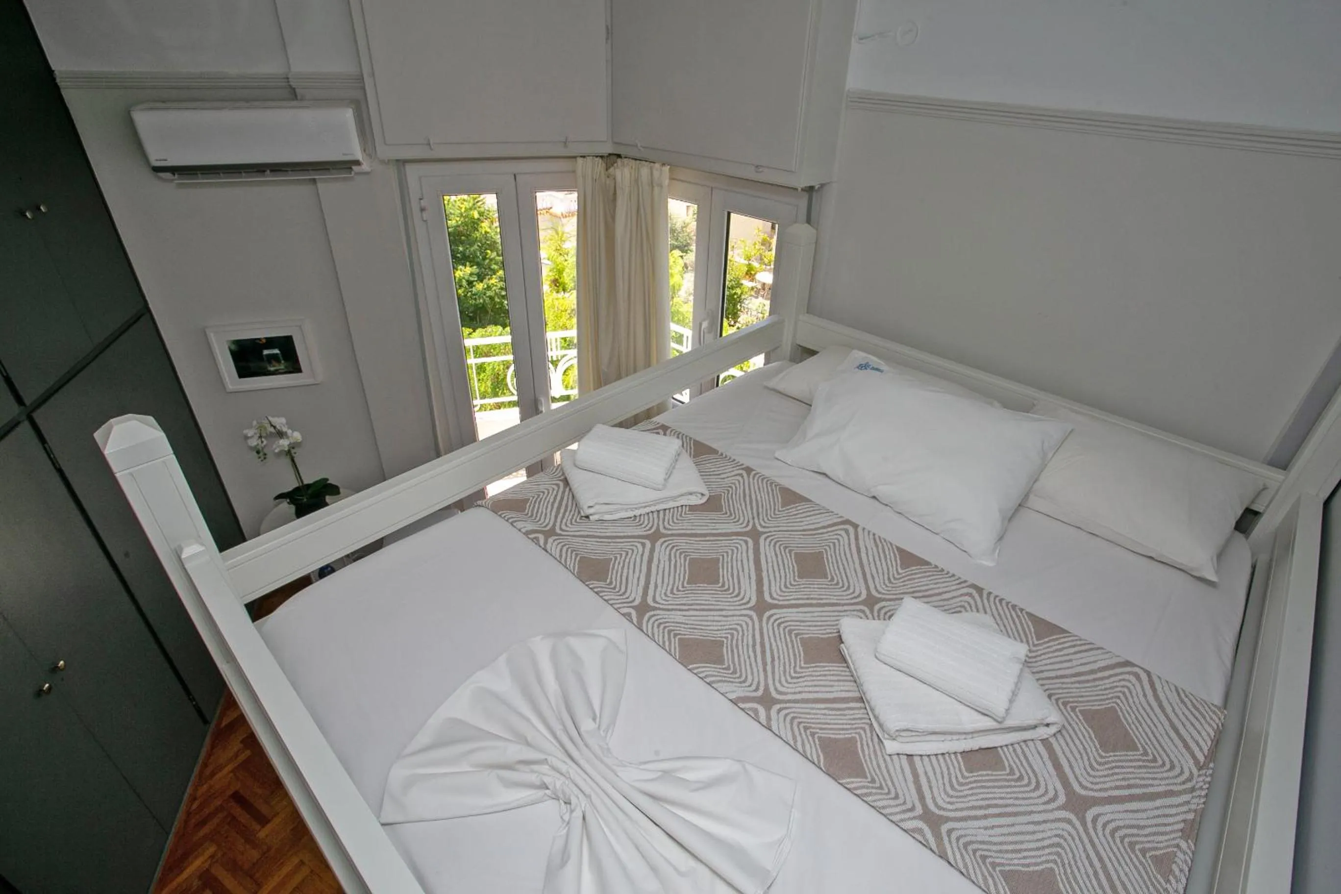 Bedroom, Bed in Erato by Heloni Apartments
