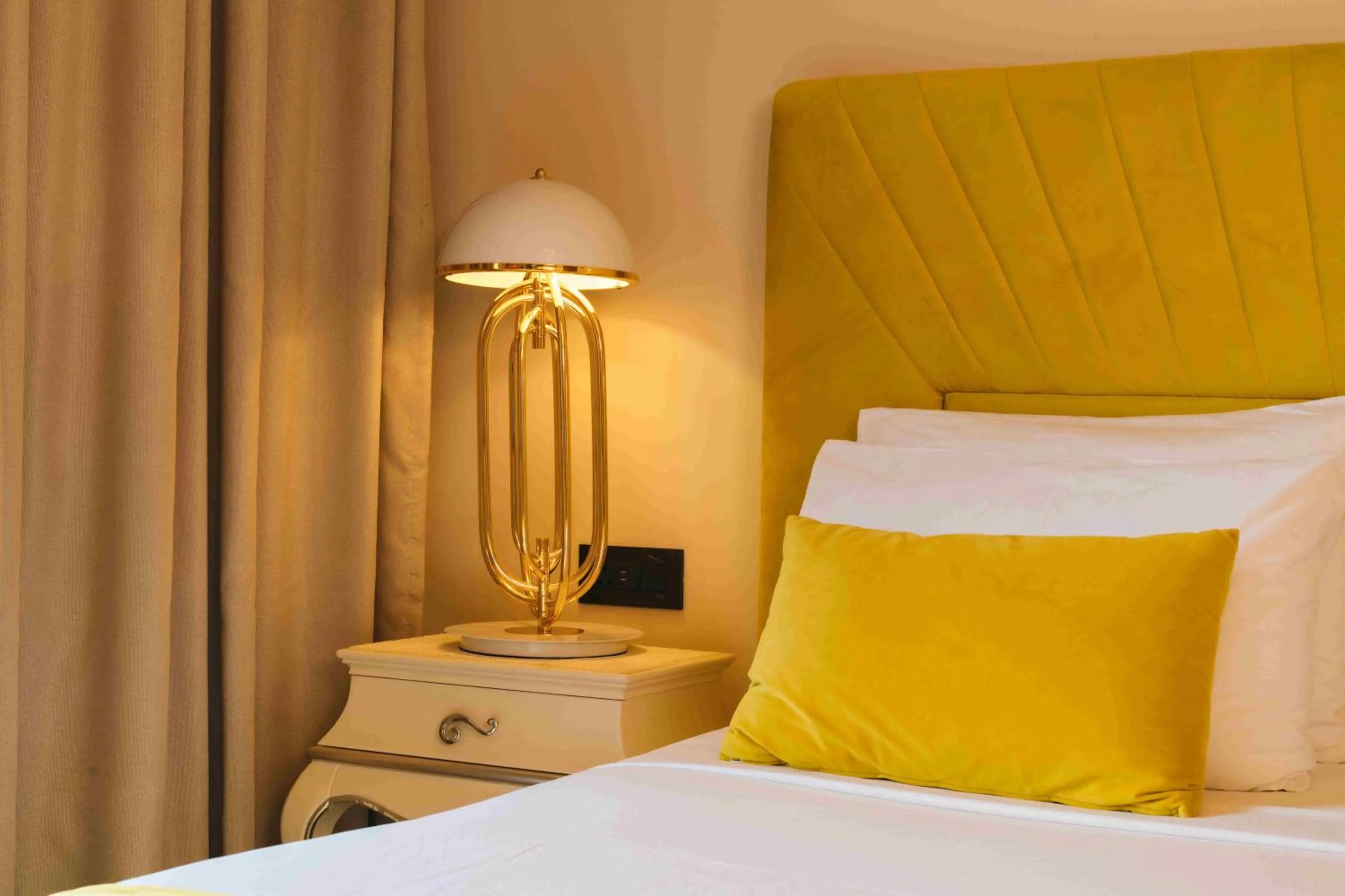 Bed in Santa Lucia Boutique Hotel