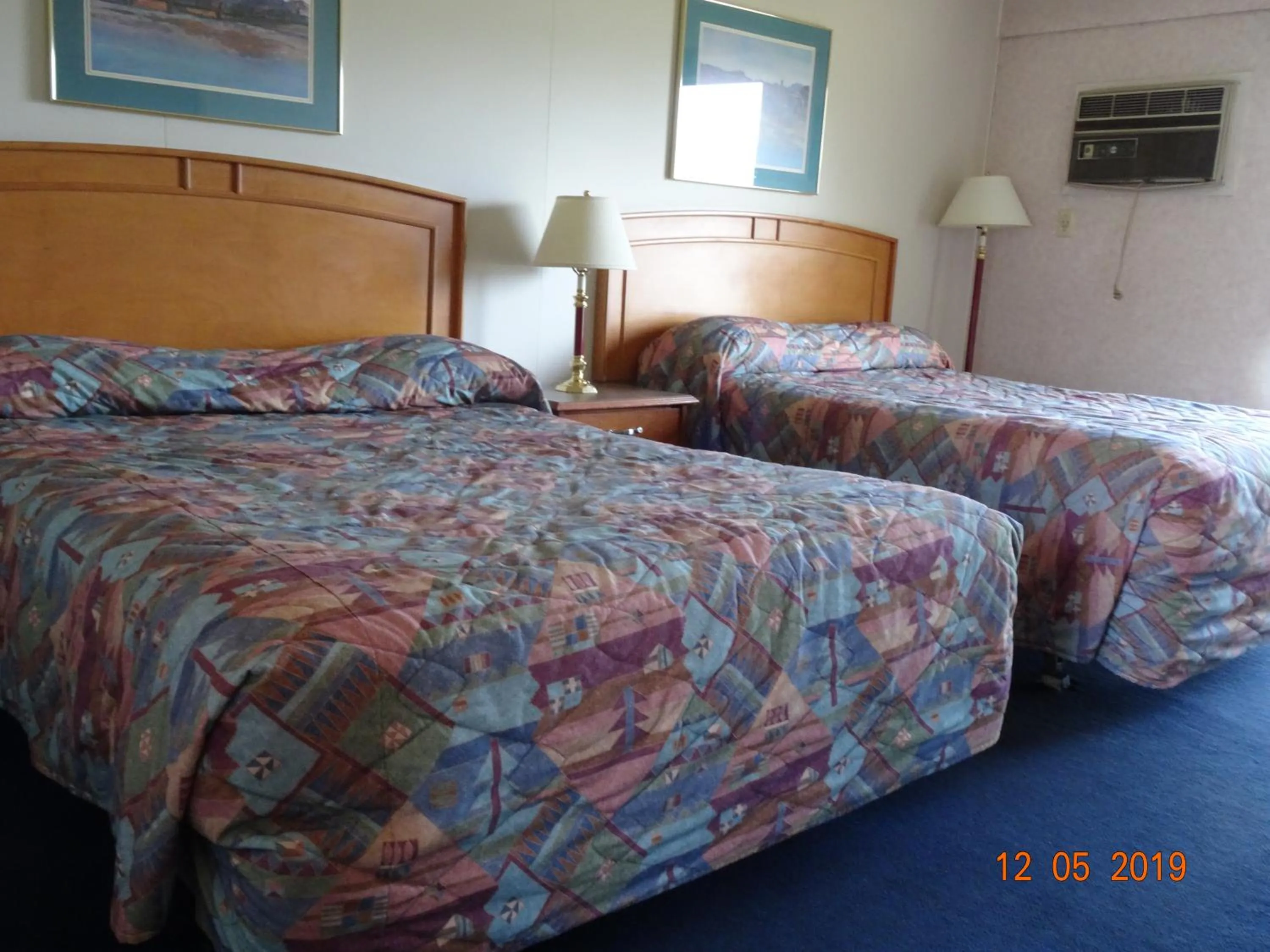 Bed in Hospitality Inn