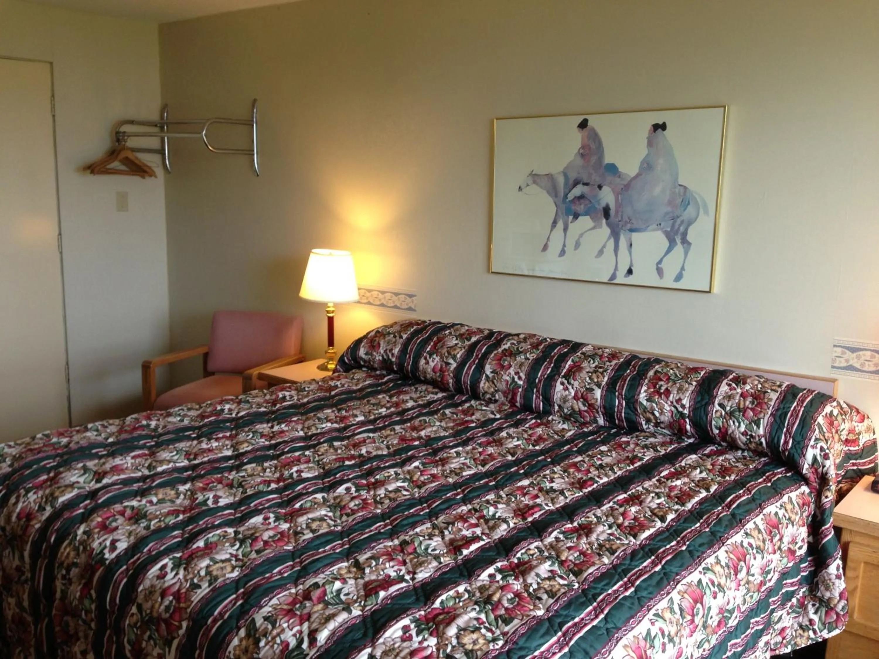 Bed in Hospitality Inn