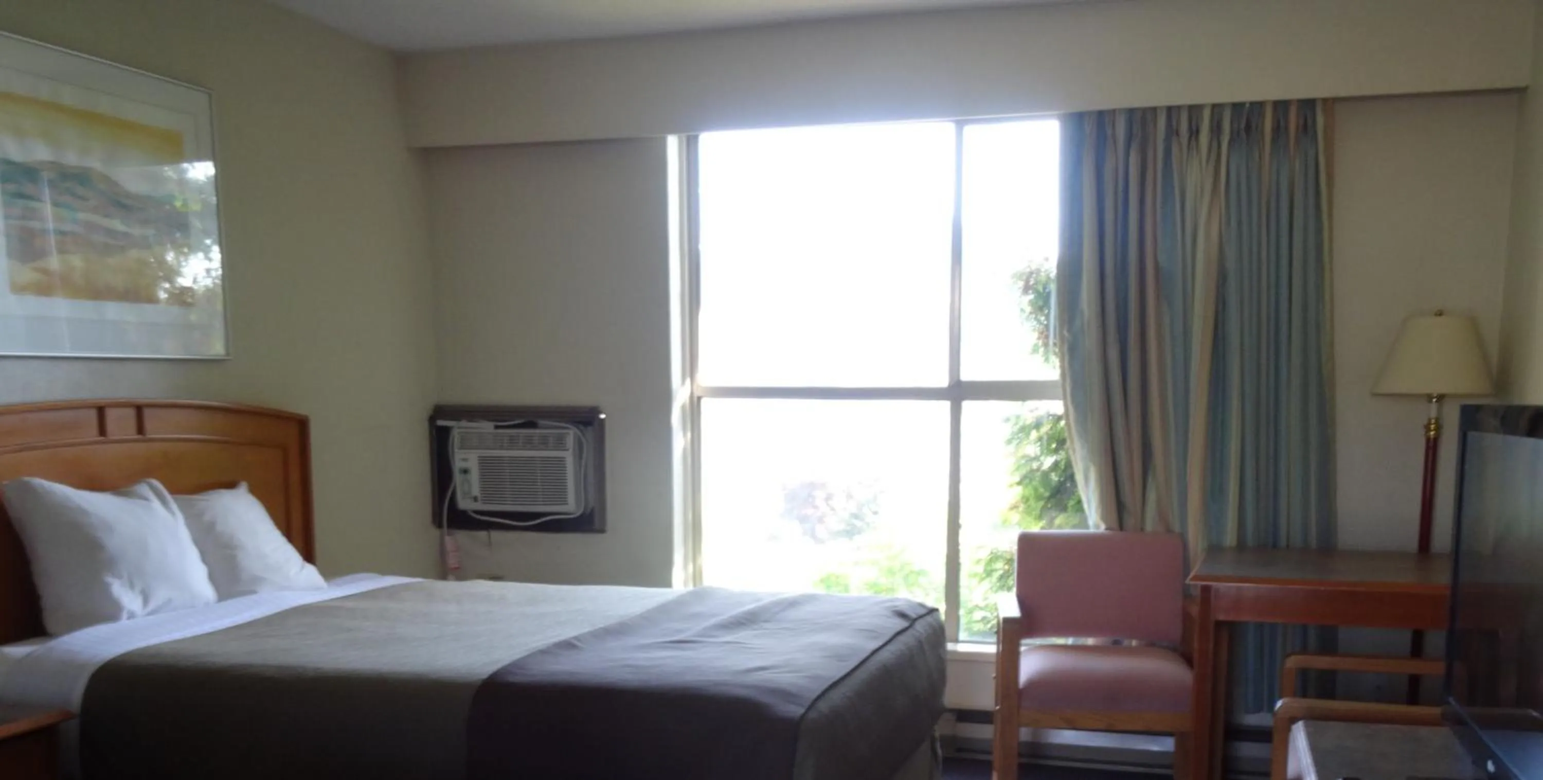 Bed in Hospitality Inn