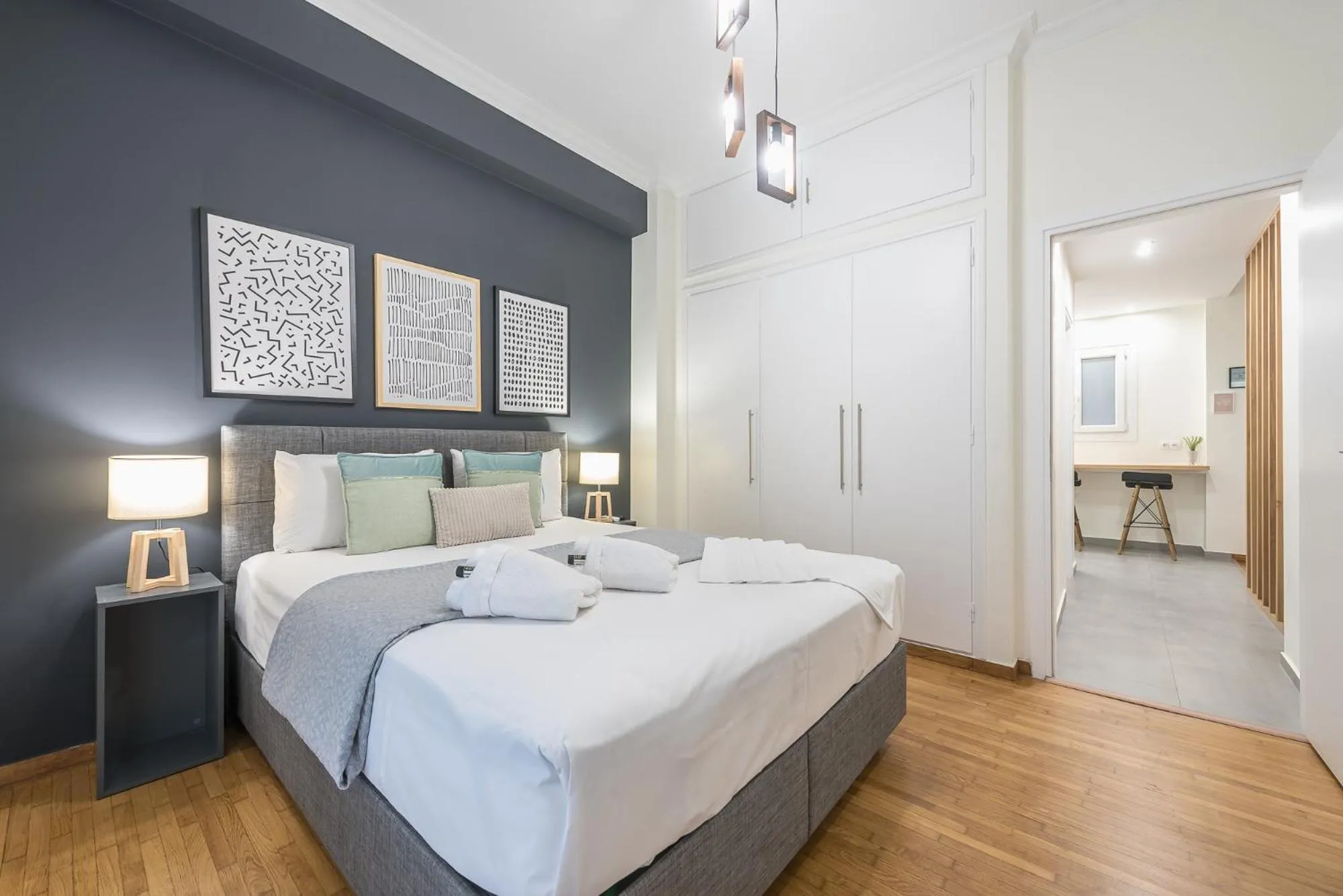 Bed in Elegant Suite by CloudKeys