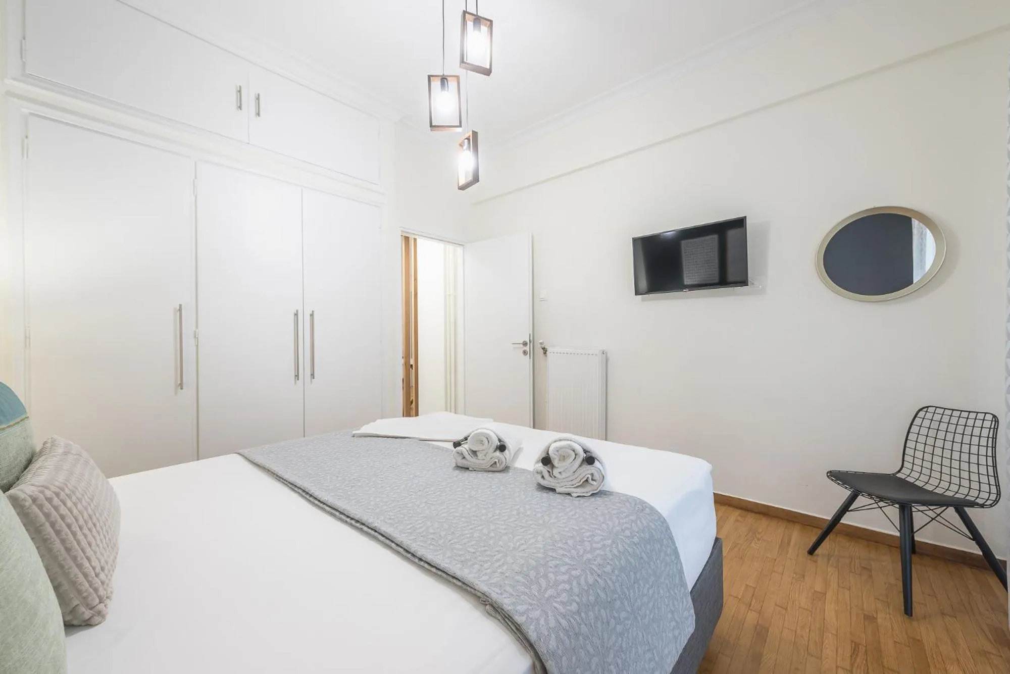 Bed in Elegant Suite by CloudKeys