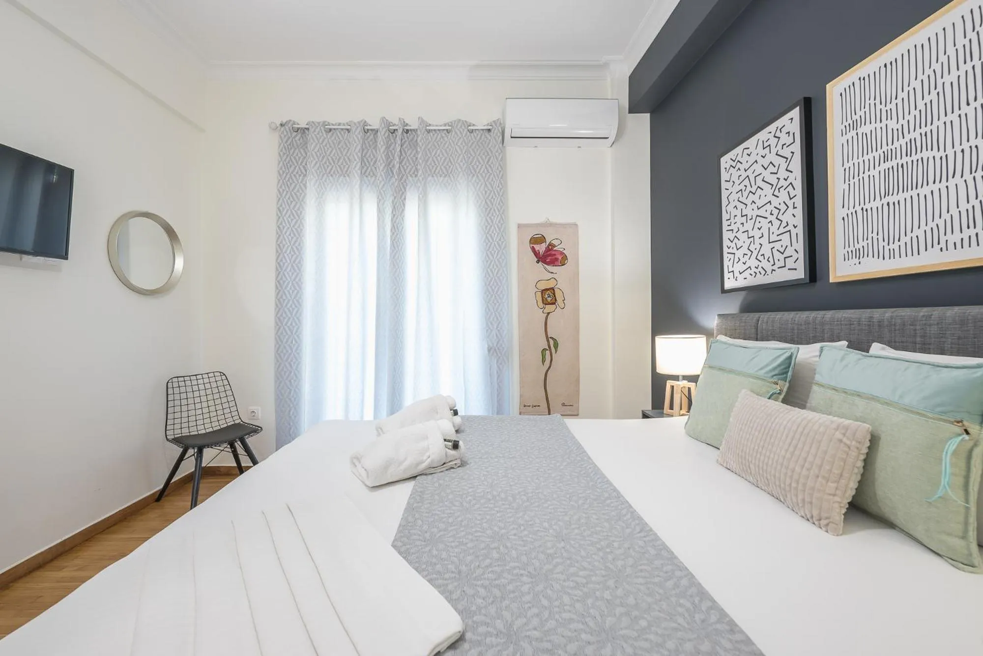 Bed in Elegant Suite by CloudKeys