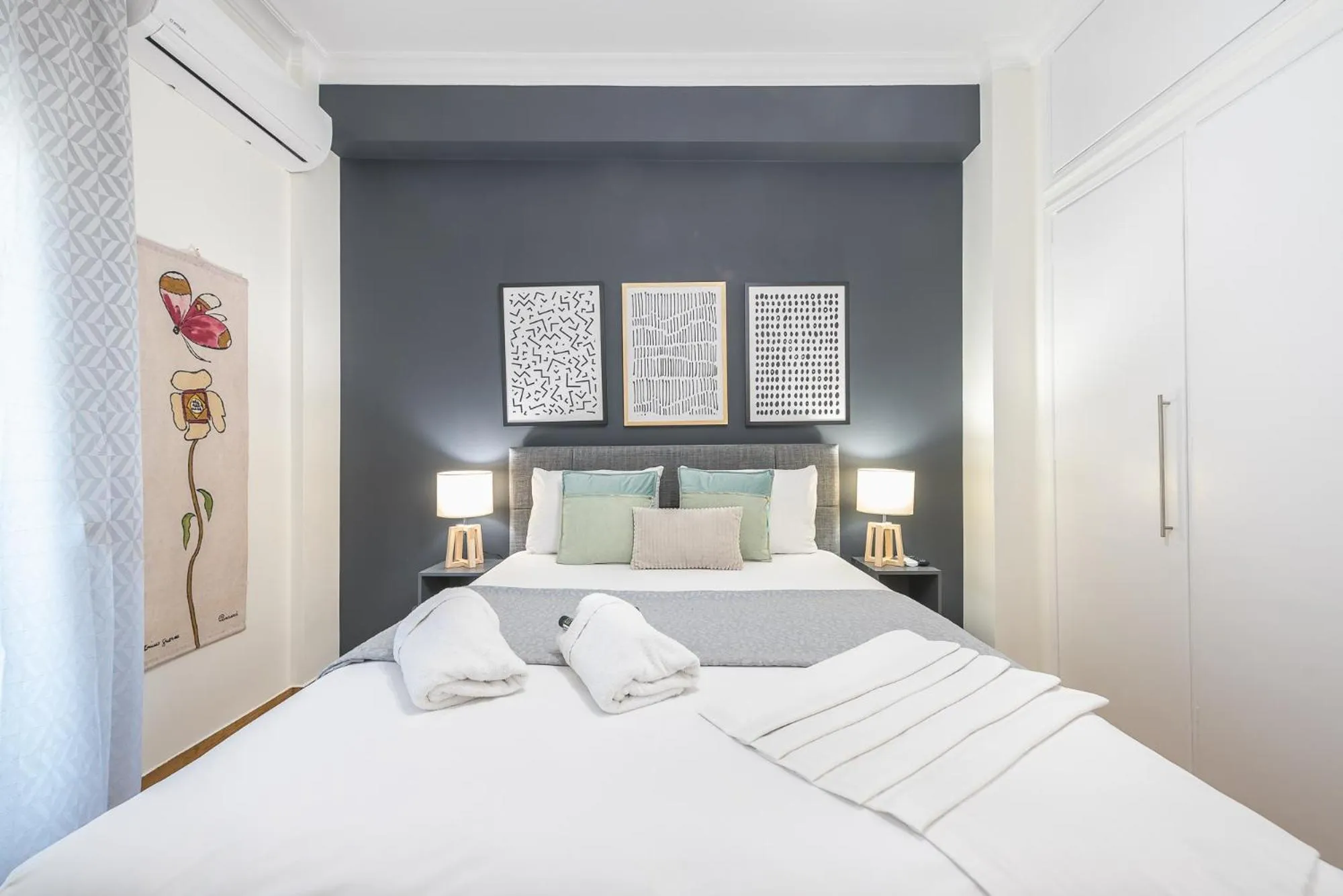 Bed in Elegant Suite by CloudKeys