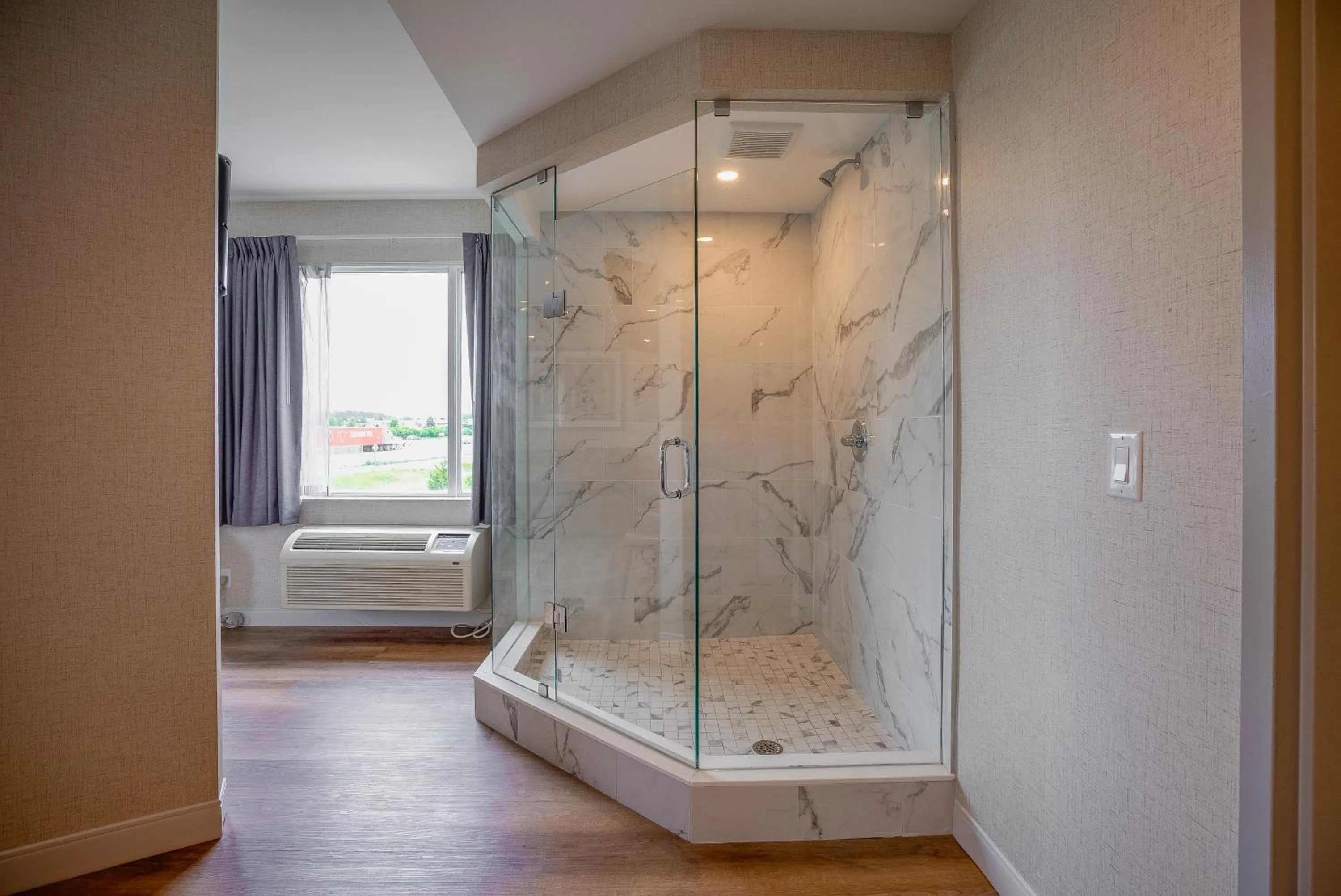 Shower in Monte Carlo Inn Oakville Suites