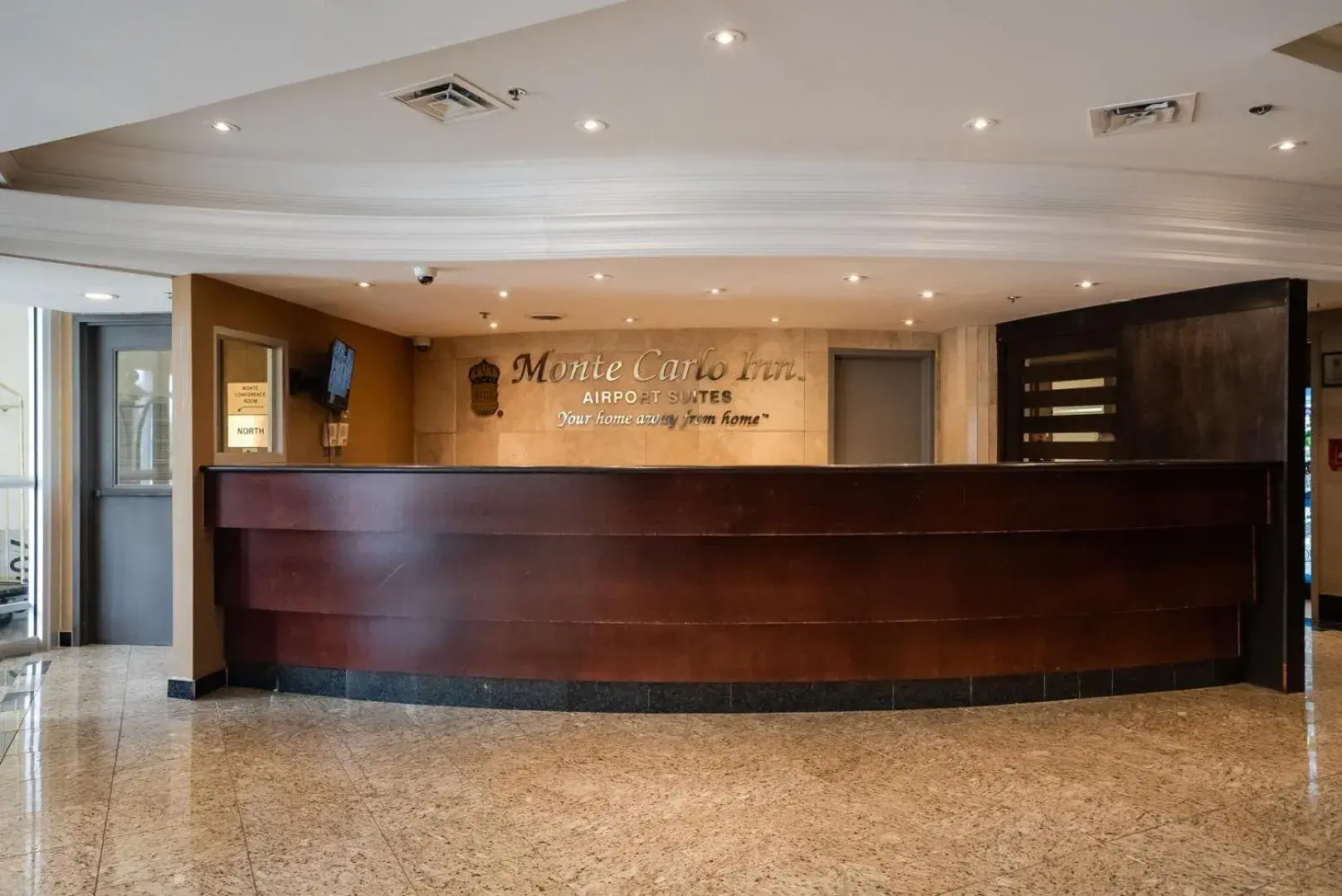 Lobby or reception in Monte Carlo Inn Airport Suites Lobby or reception in Monte Carlo Inn Airport Suites