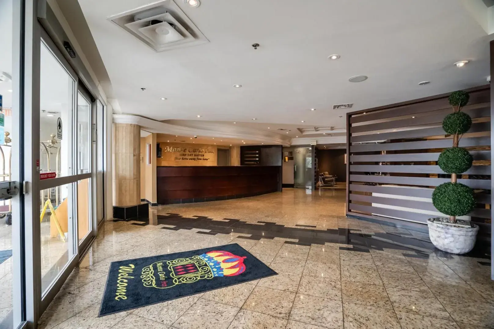 Lobby or reception in Monte Carlo Inn Airport Suites Lobby or reception in Monte Carlo Inn Airport Suites