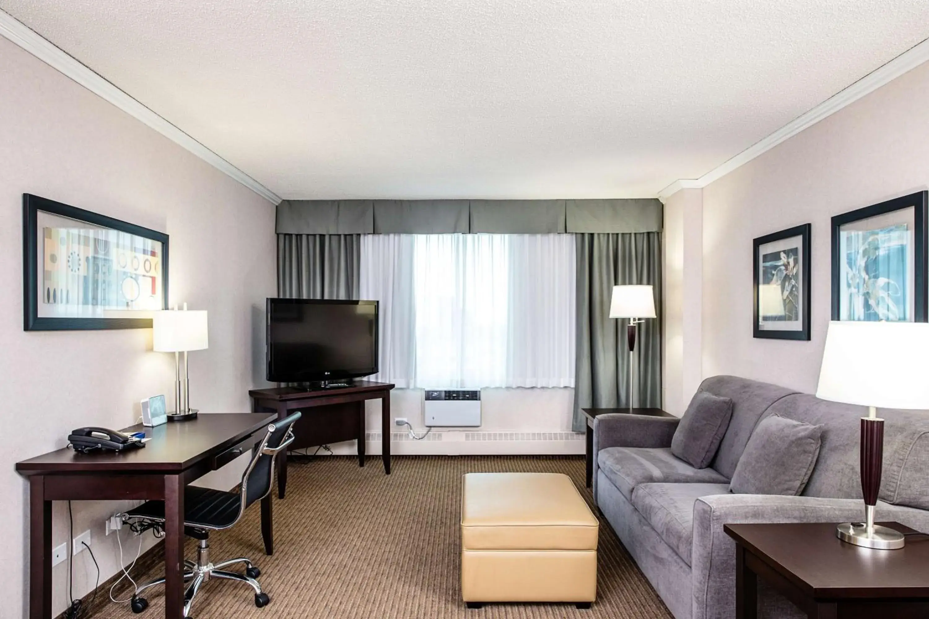 Living room in Campus Tower Suite Hotel Living room in Campus Tower Suite Hotel