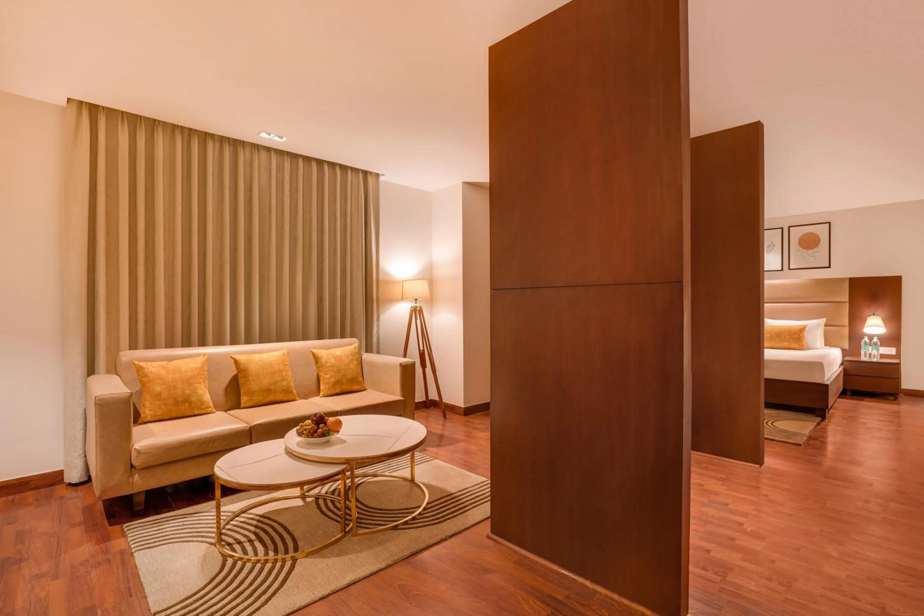 Living room, Bed in Lemon Tree Hotel, Noida