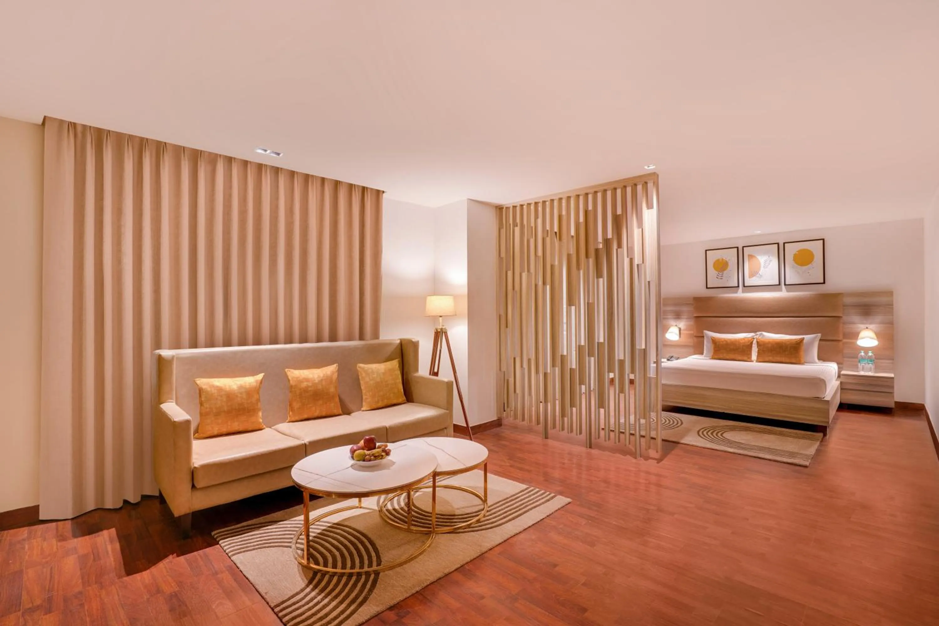 Living room, Bed in Lemon Tree Hotel, Noida