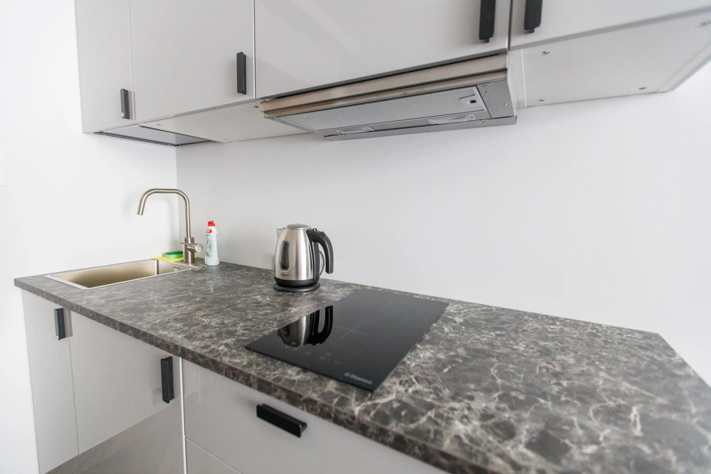 Kitchen or kitchenette in Seaside Central Hotel