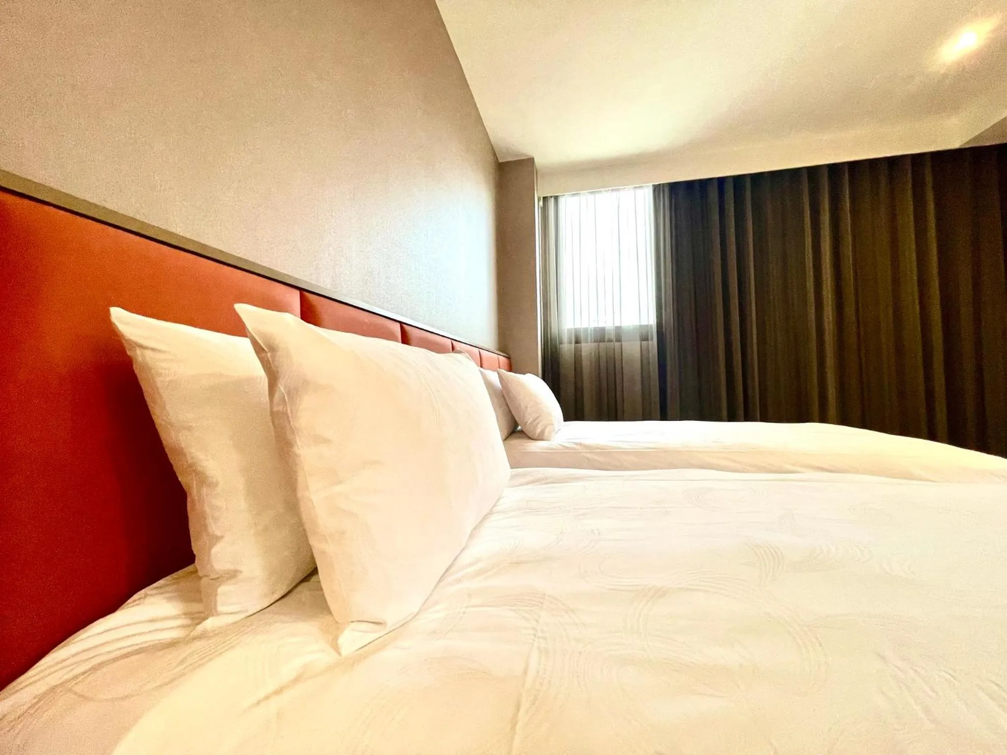 Bed in Tenz Go Hotel