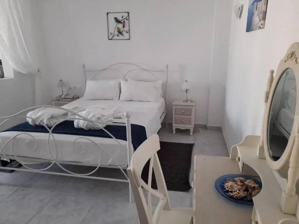 Bed in Sea paradise villas - Seaside & private jacuzzi