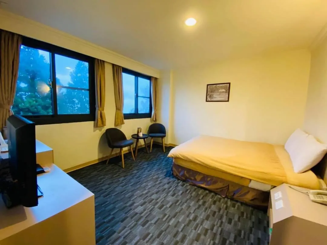 Bed in Yin Shan Hotel