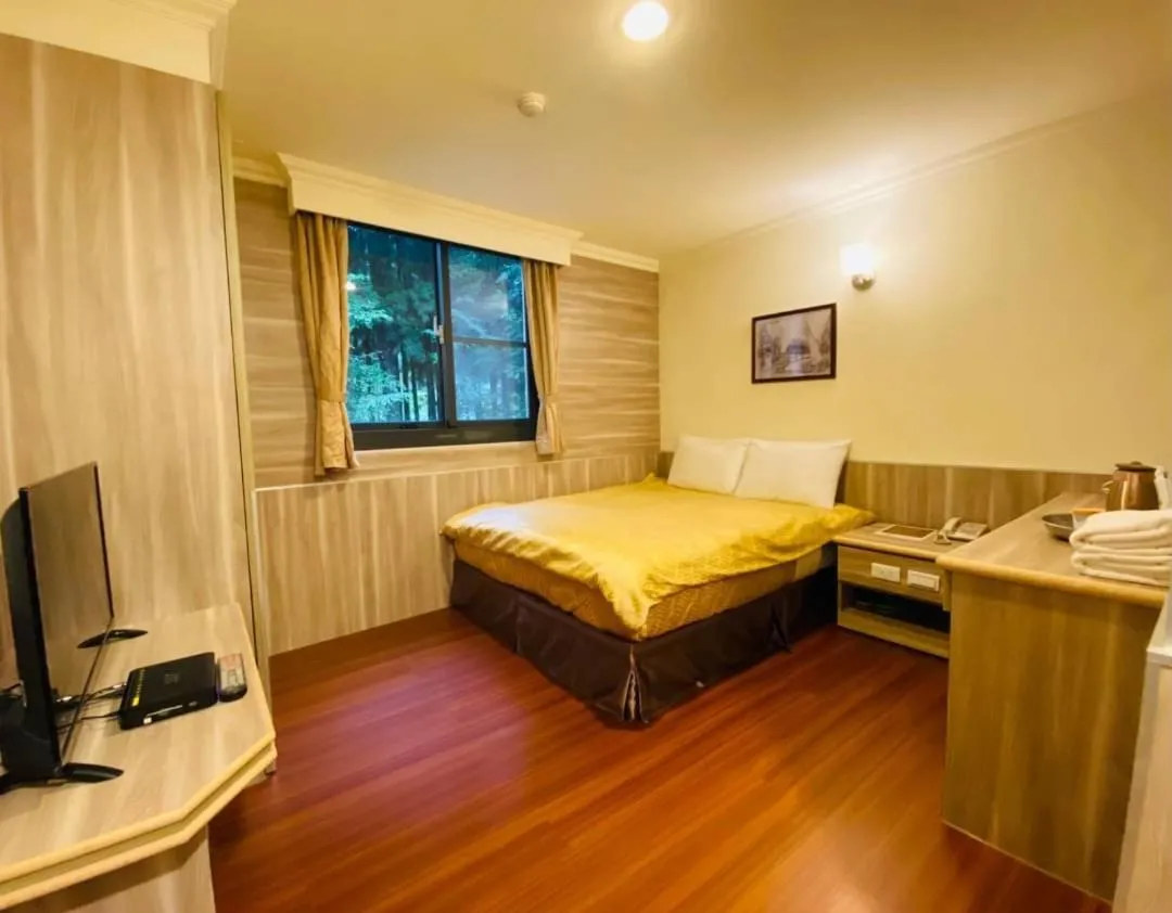 Bed in Yin Shan Hotel