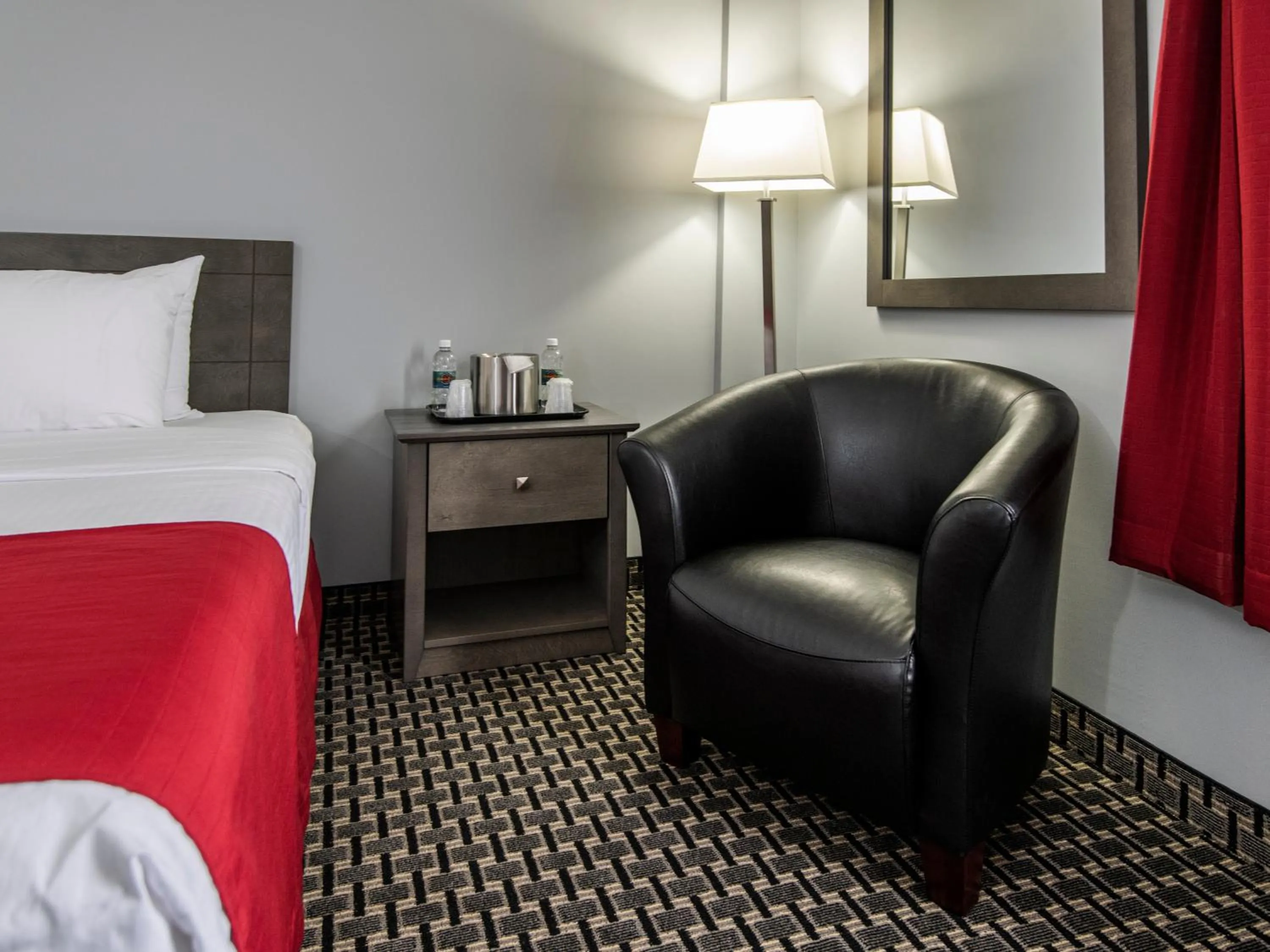 Seating area, Bed in Paradise Inn & Conference Centre