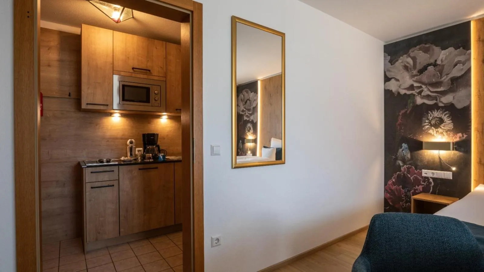 Kitchen or kitchenette in Aparthotel Chiemgaufuchs - CHIEMGAUKARTE