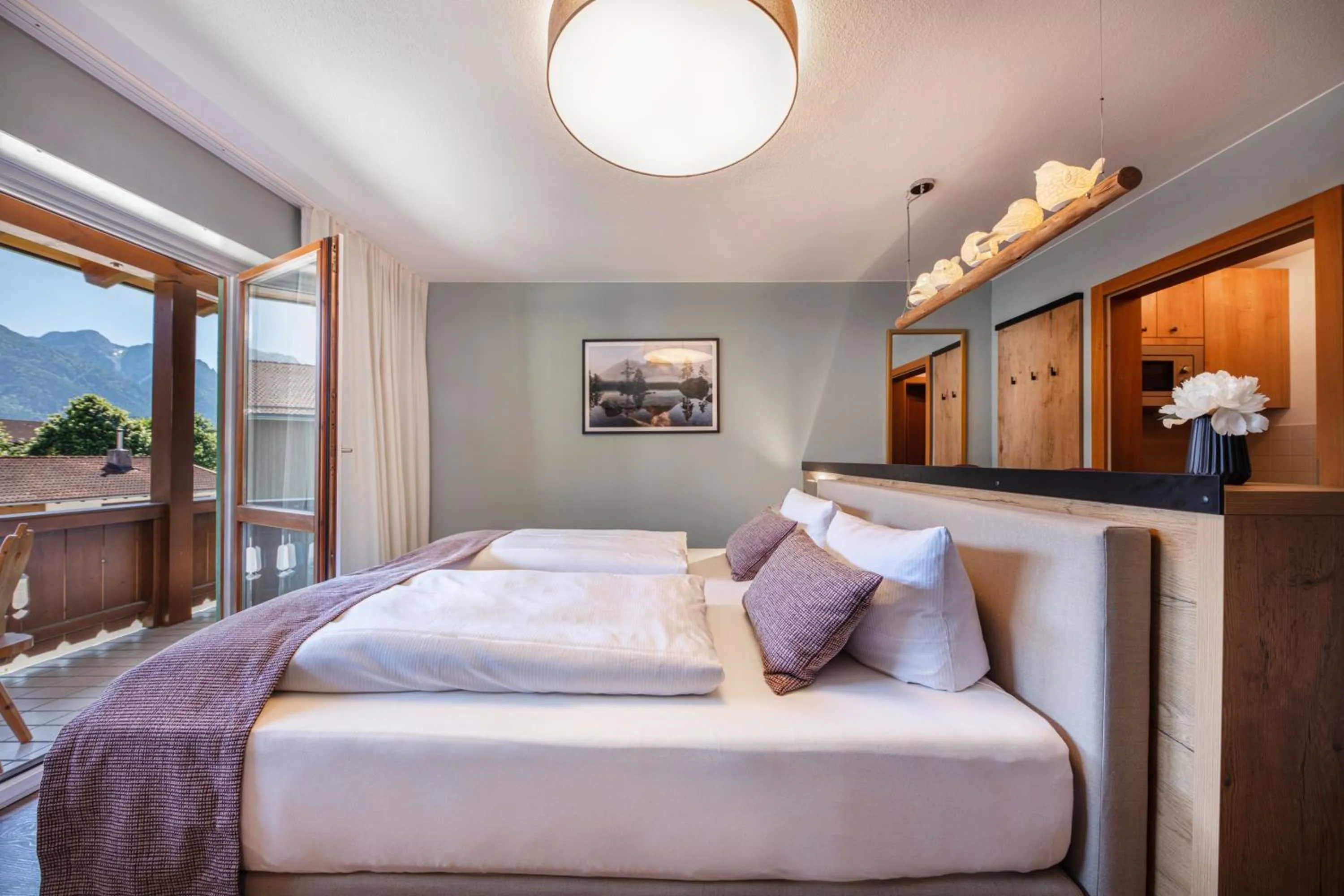 Photo of the whole room, Bed in Aparthotel Chiemgaufuchs - CHIEMGAUKARTE