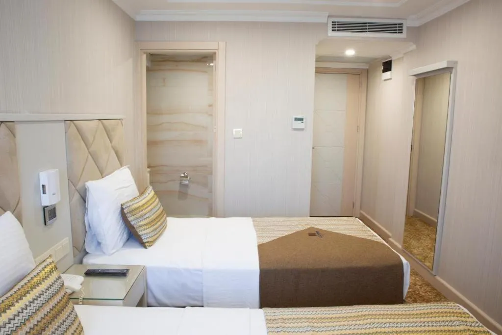 Bed in Alpinn Hotel DUE