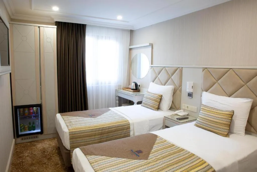 Bed in Alpinn Hotel DUE