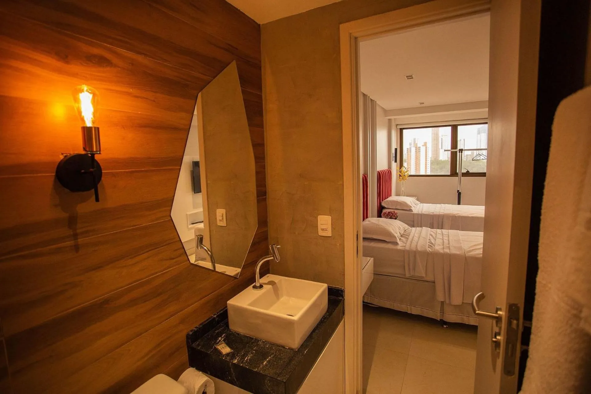 Toilet, Bed in Manaíra Apart Hotel por Carpediem