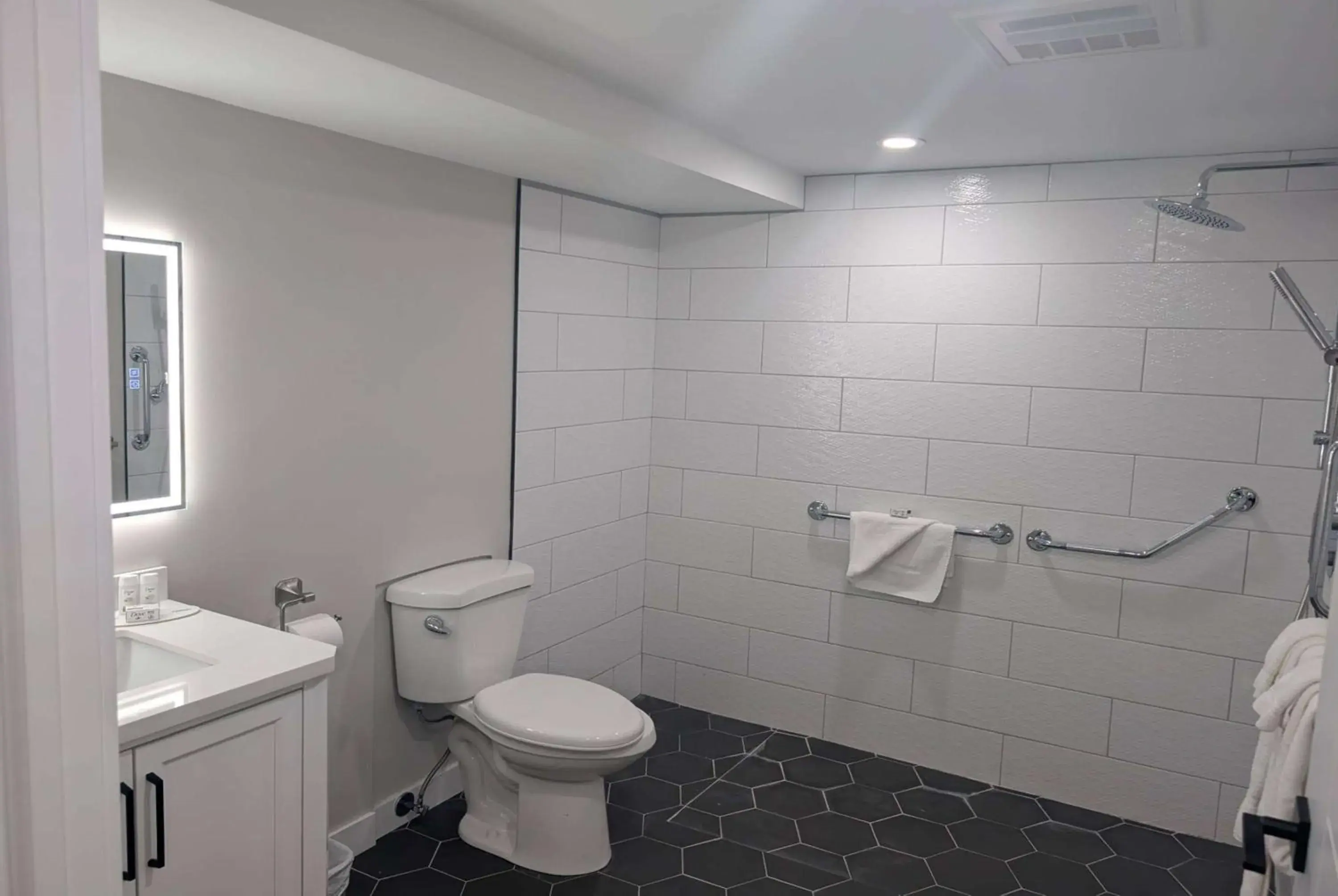 Bathroom in Baymont by Wyndham Red Deer Bathroom in Baymont by Wyndham Red Deer