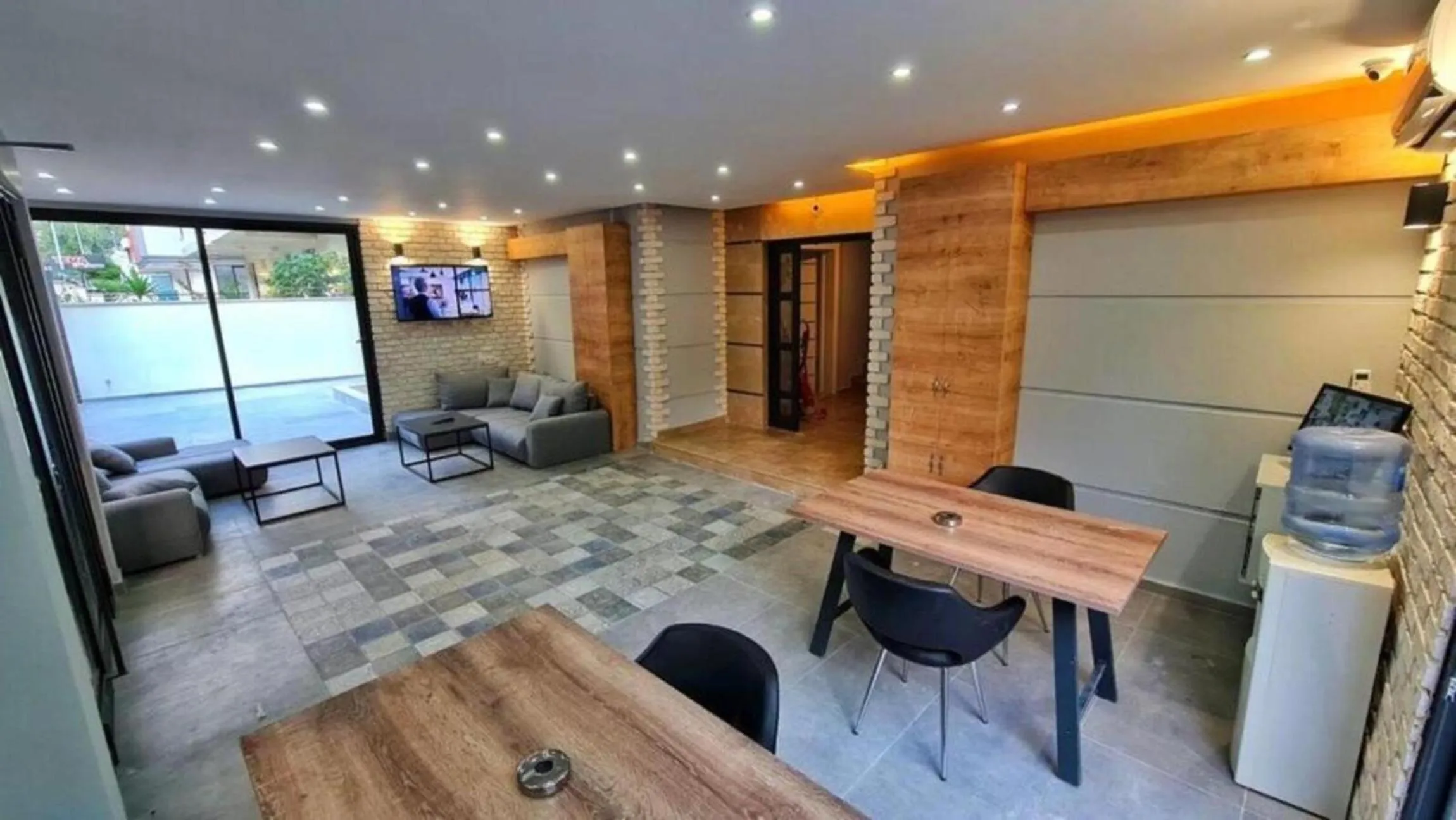 Communal lounge/ TV room in Sun Suites