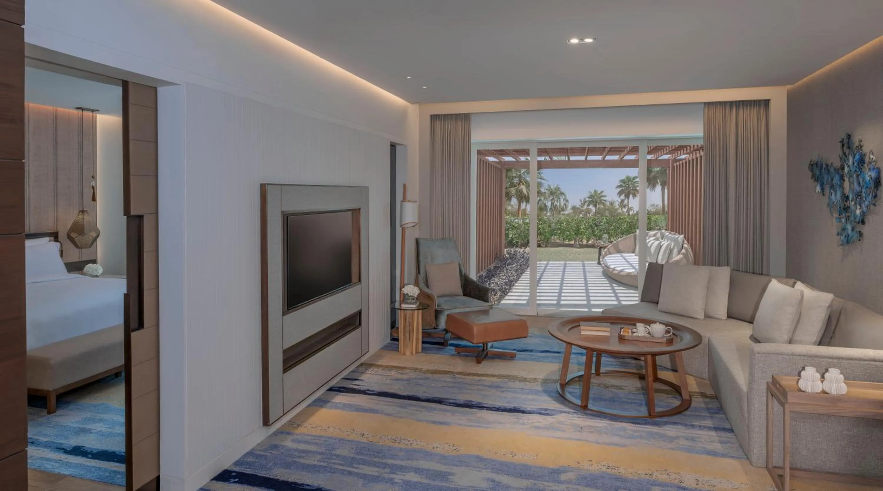 Living room, Bed in InterContinental Ras Al Khaimah Mina Al Arab Resort & Spa by IHG