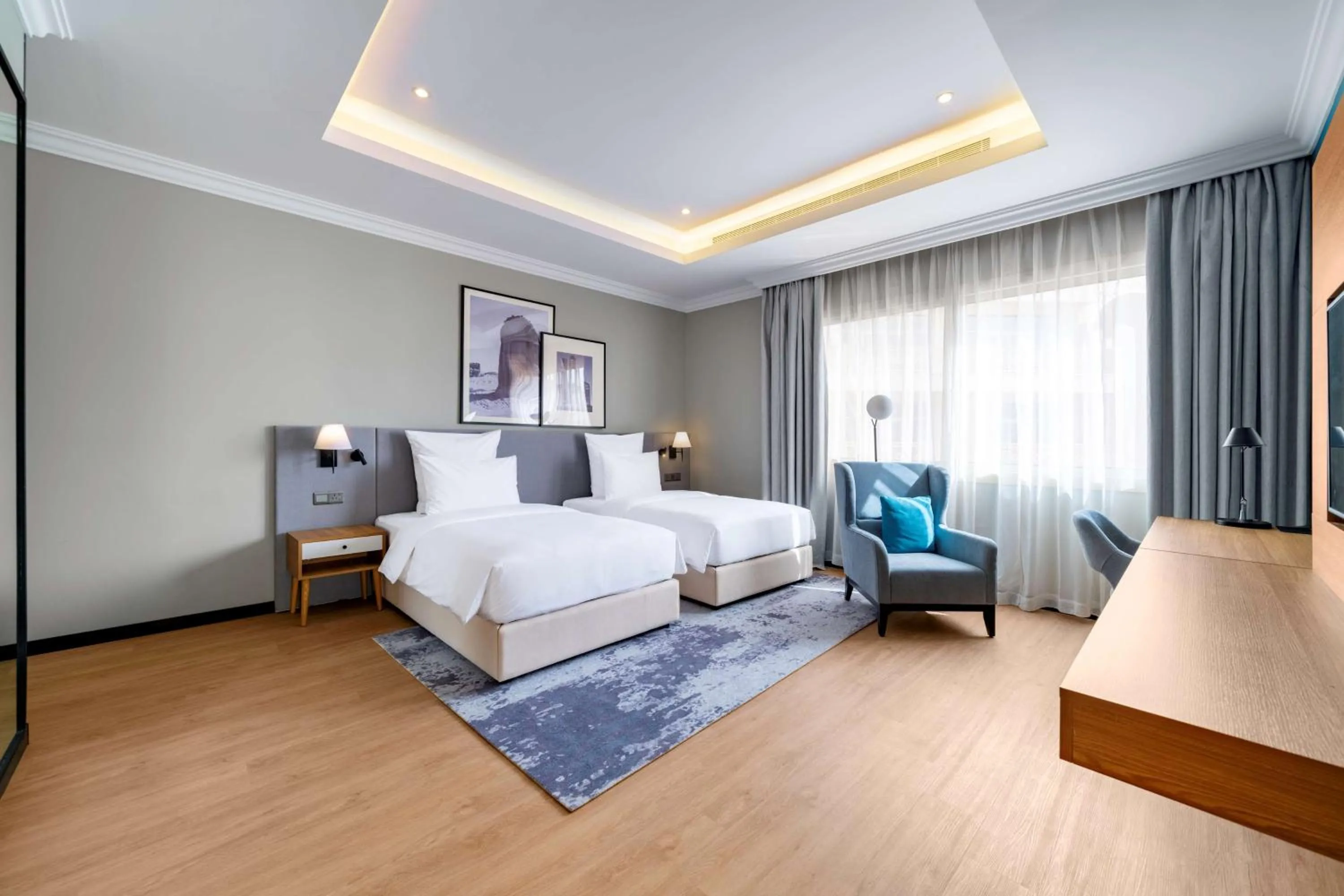 Photo of the whole room, Bed in Radisson Hotel Riyadh Airport