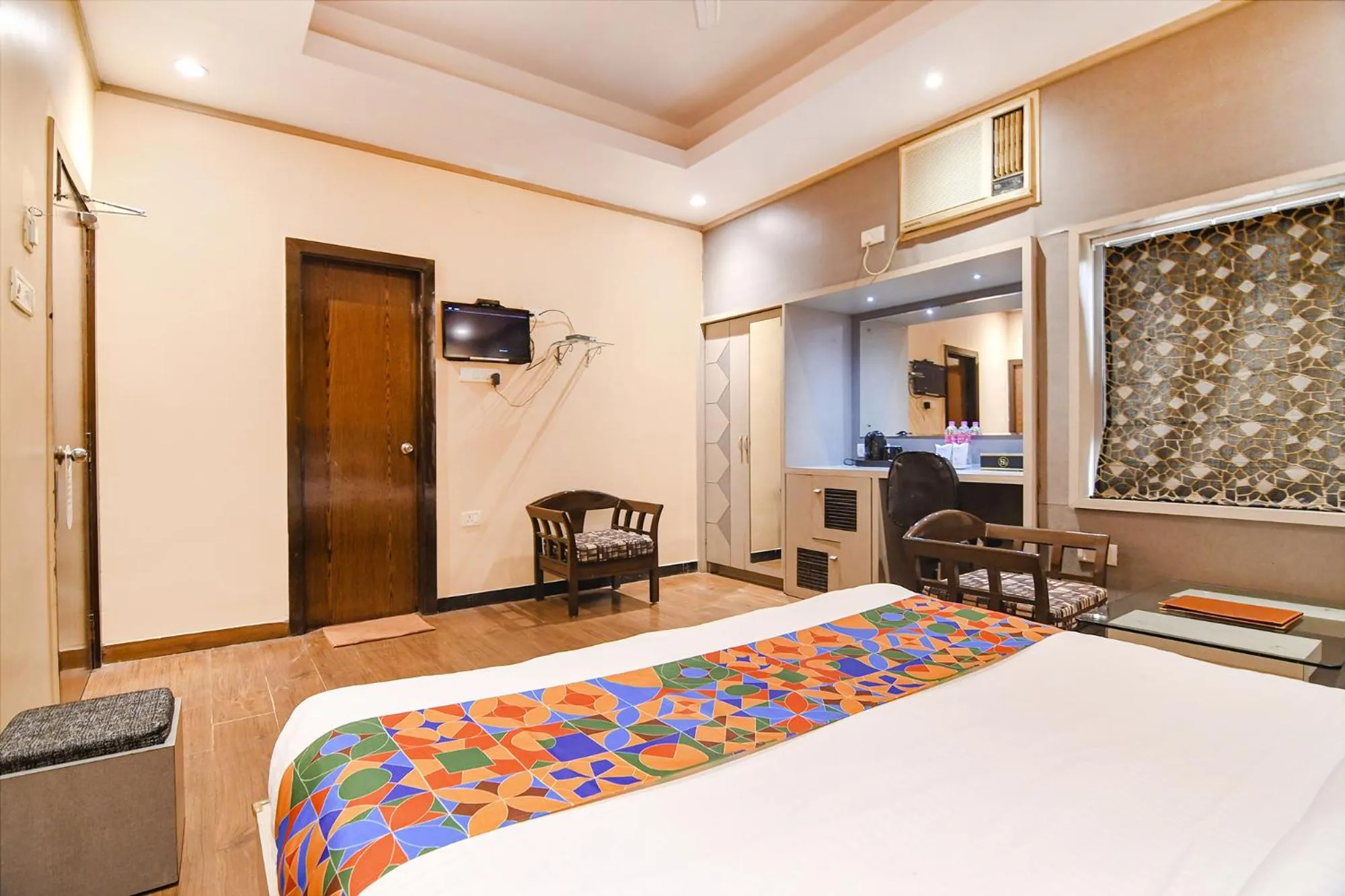 Bed in FabHotel Shivani International
