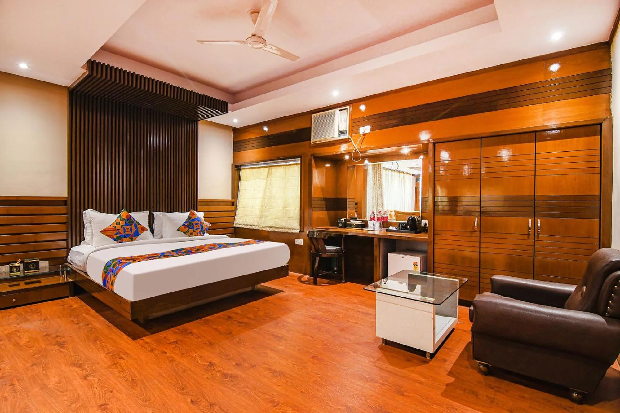 Bed in FabHotel Shivani International