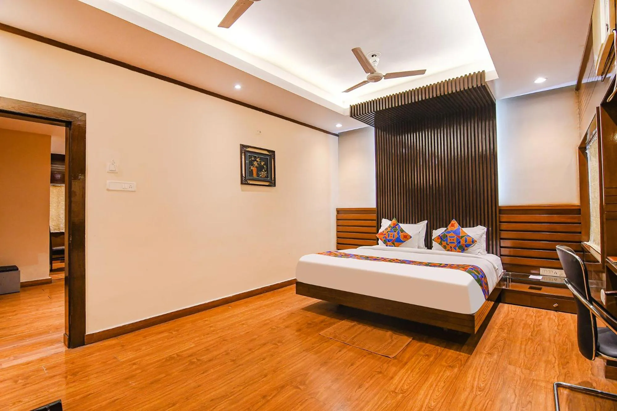 Bed in FabHotel Shivani International