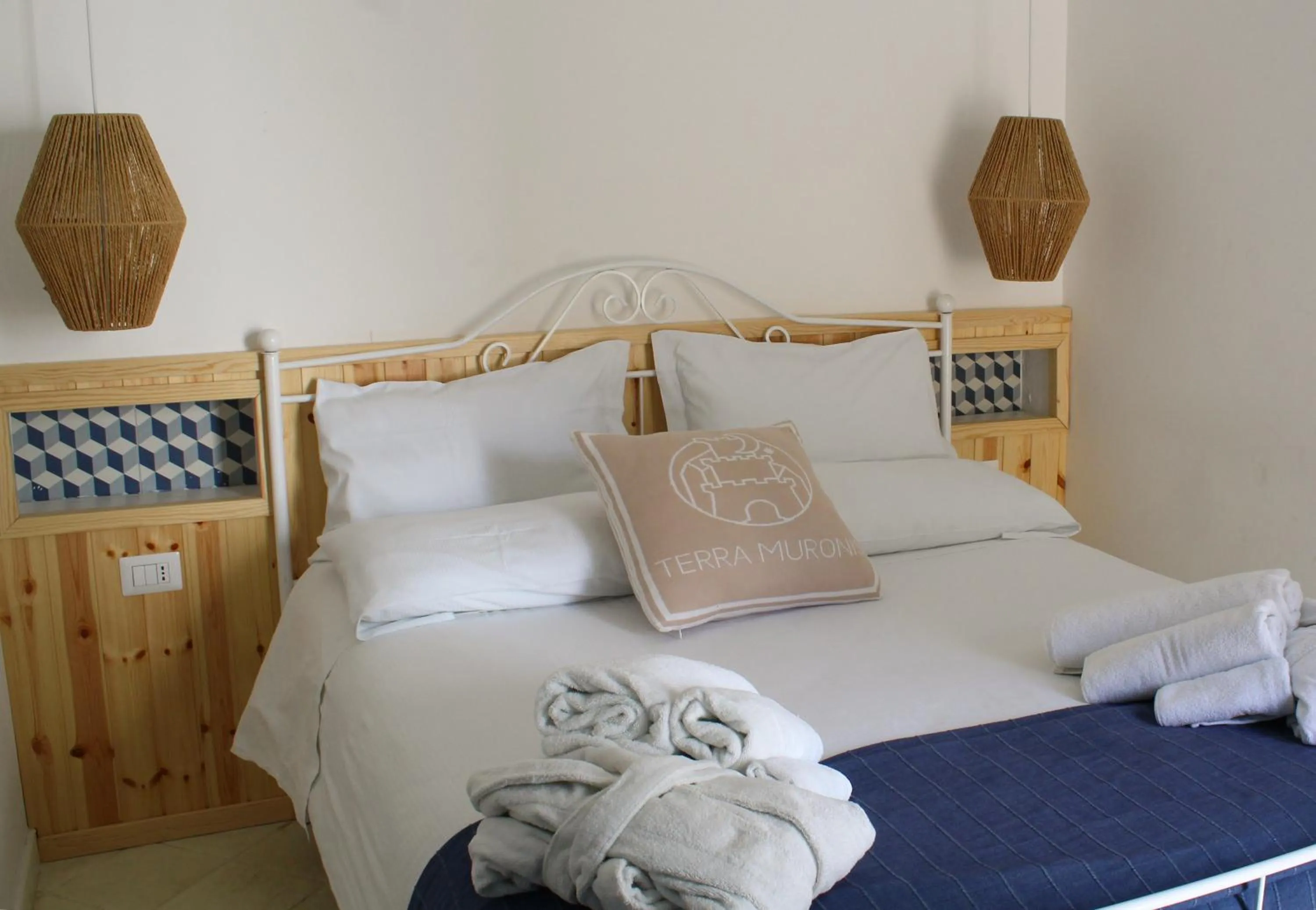 Bed in Terra Muronis Hotel Diffuso