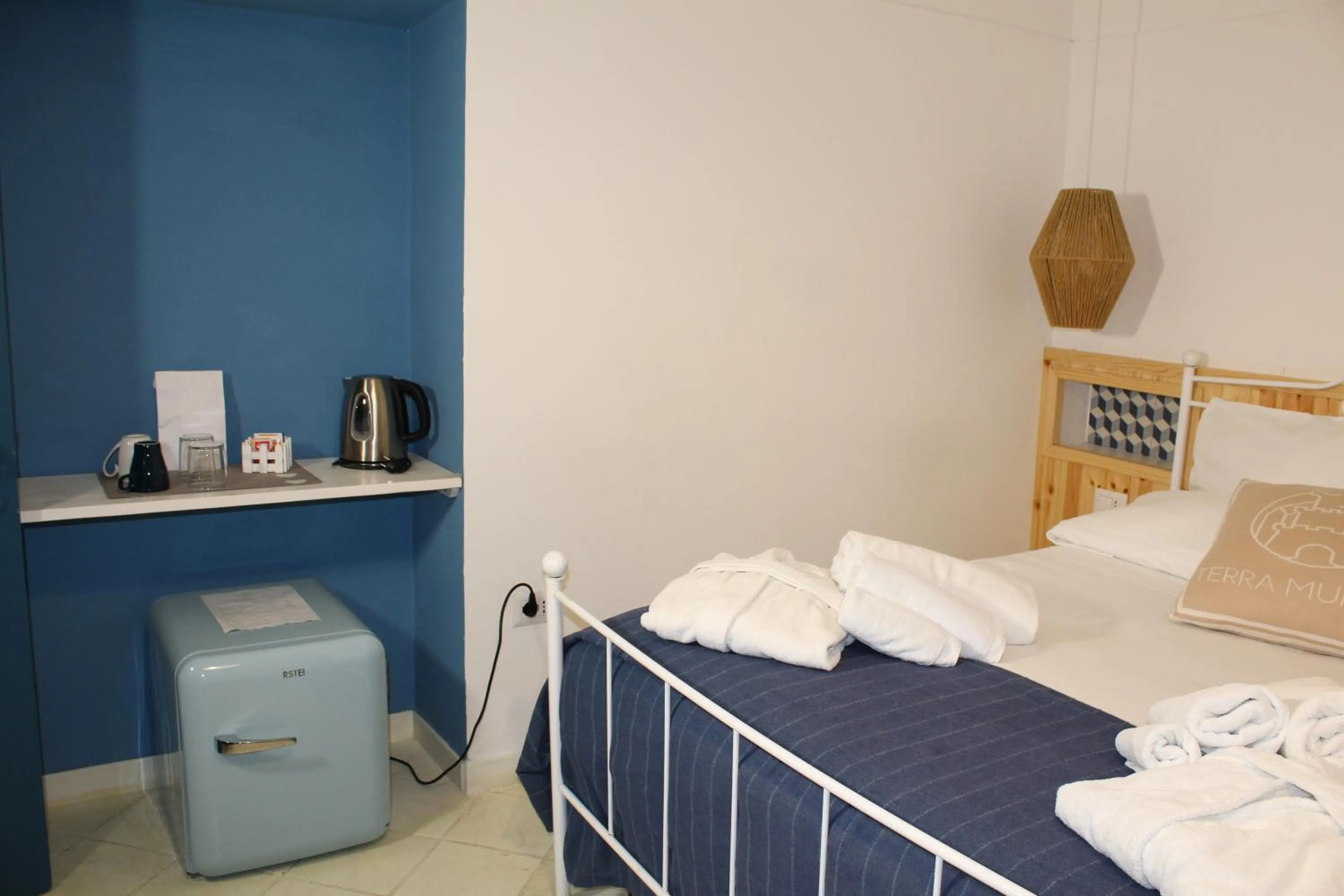 Bed in Terra Muronis Hotel Diffuso