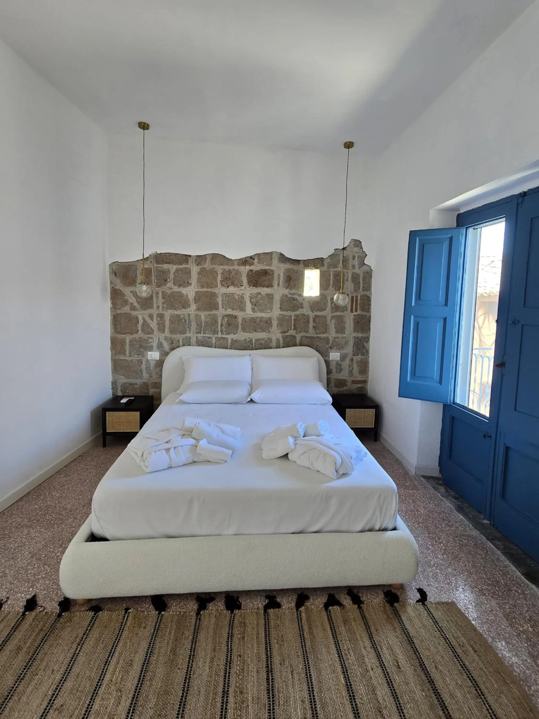 Bed in Terra Muronis Hotel Diffuso