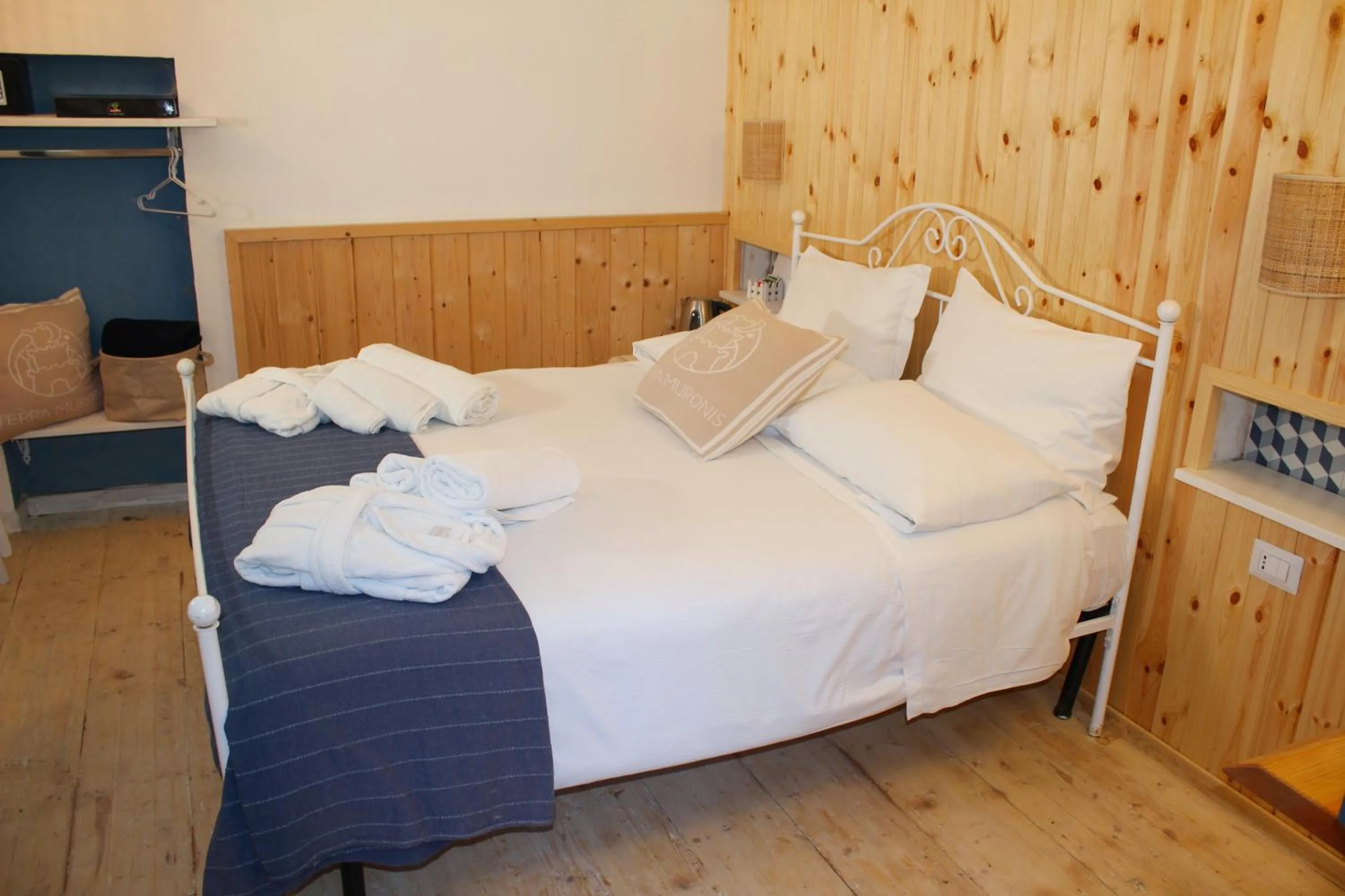 Bed in Terra Muronis Hotel Diffuso