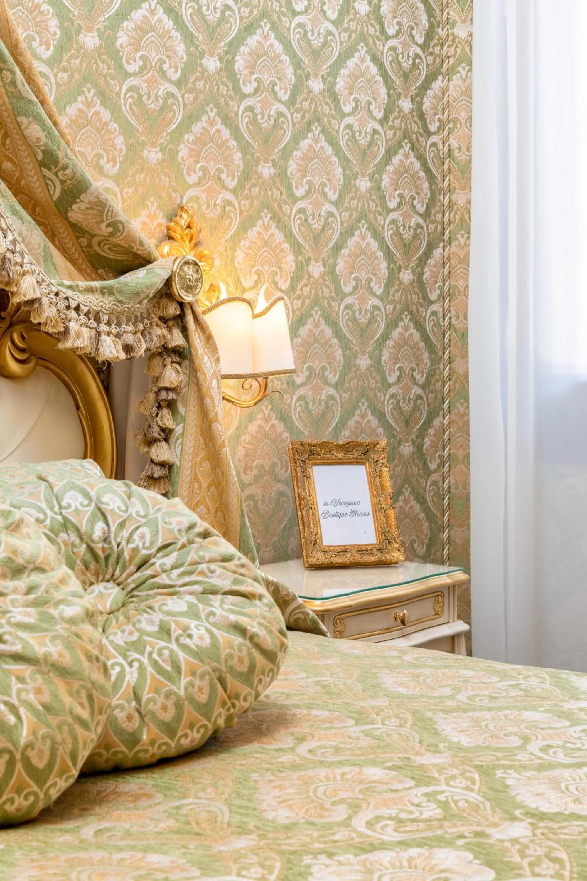 Decorative detail, Bed in La Veneziana Boutique Rooms
