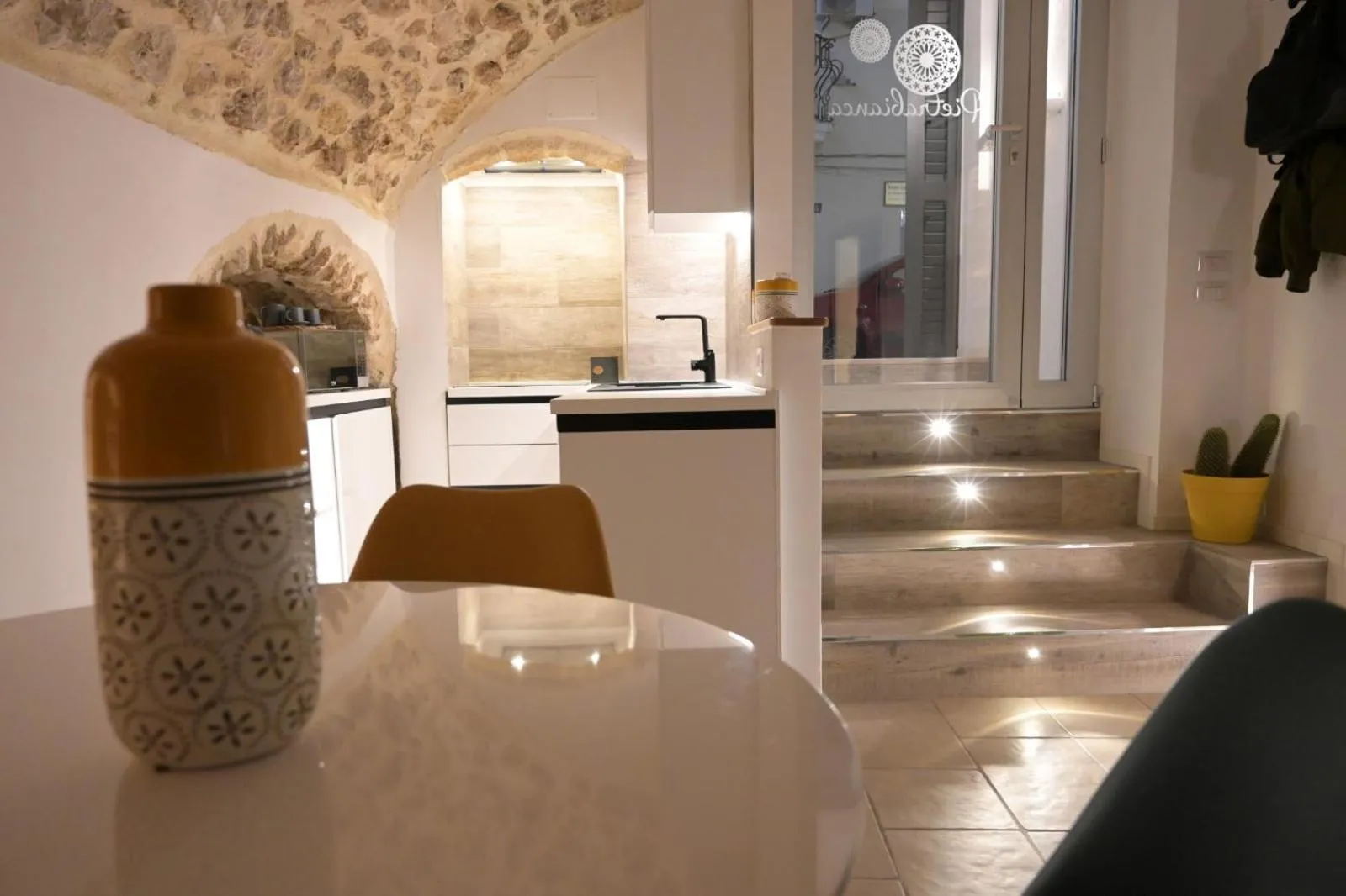 Seating area in Pietrabianca Santa Maria Apartments