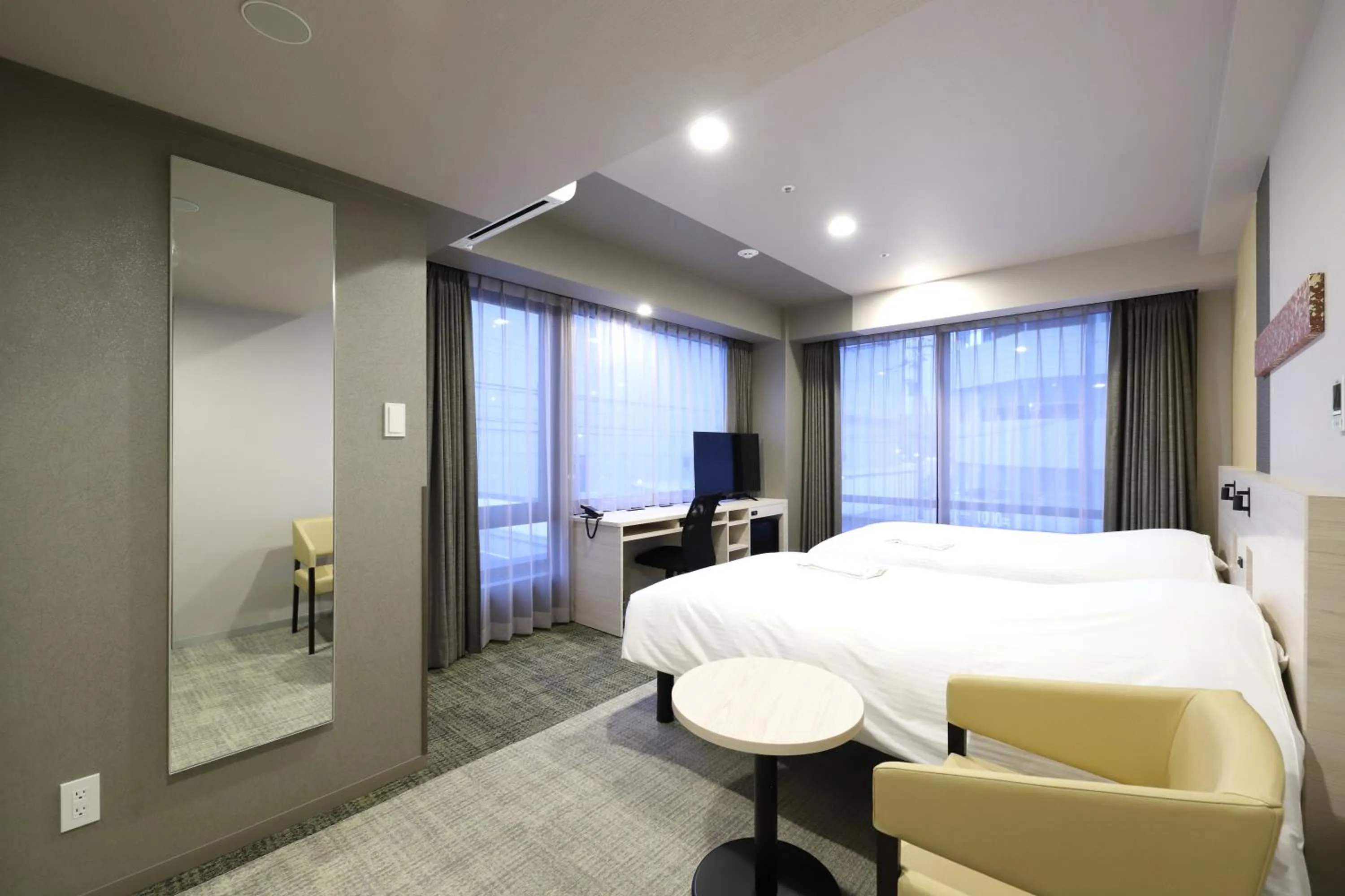 Bed in Smile Hotel Kanazawa Nishiguchi Ekimae