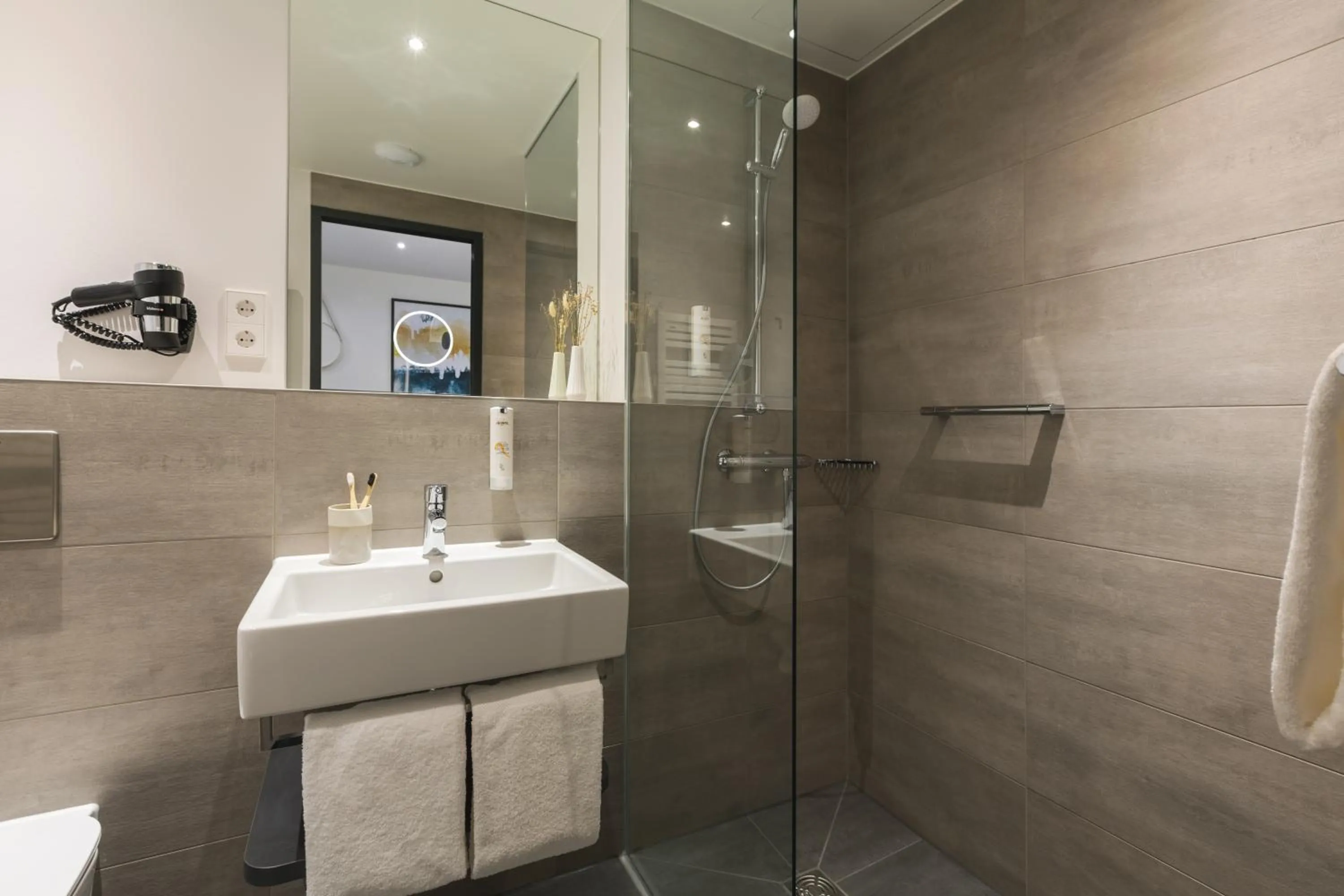 Toilet in Candlewood Suites Berlin Charlottenburg by IHG