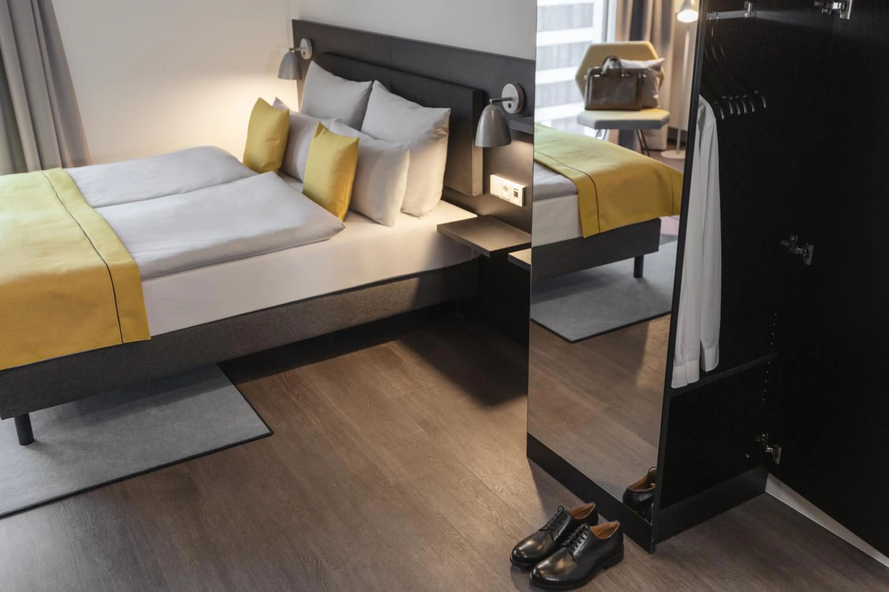 Living room, Bed in Candlewood Suites Berlin Charlottenburg by IHG