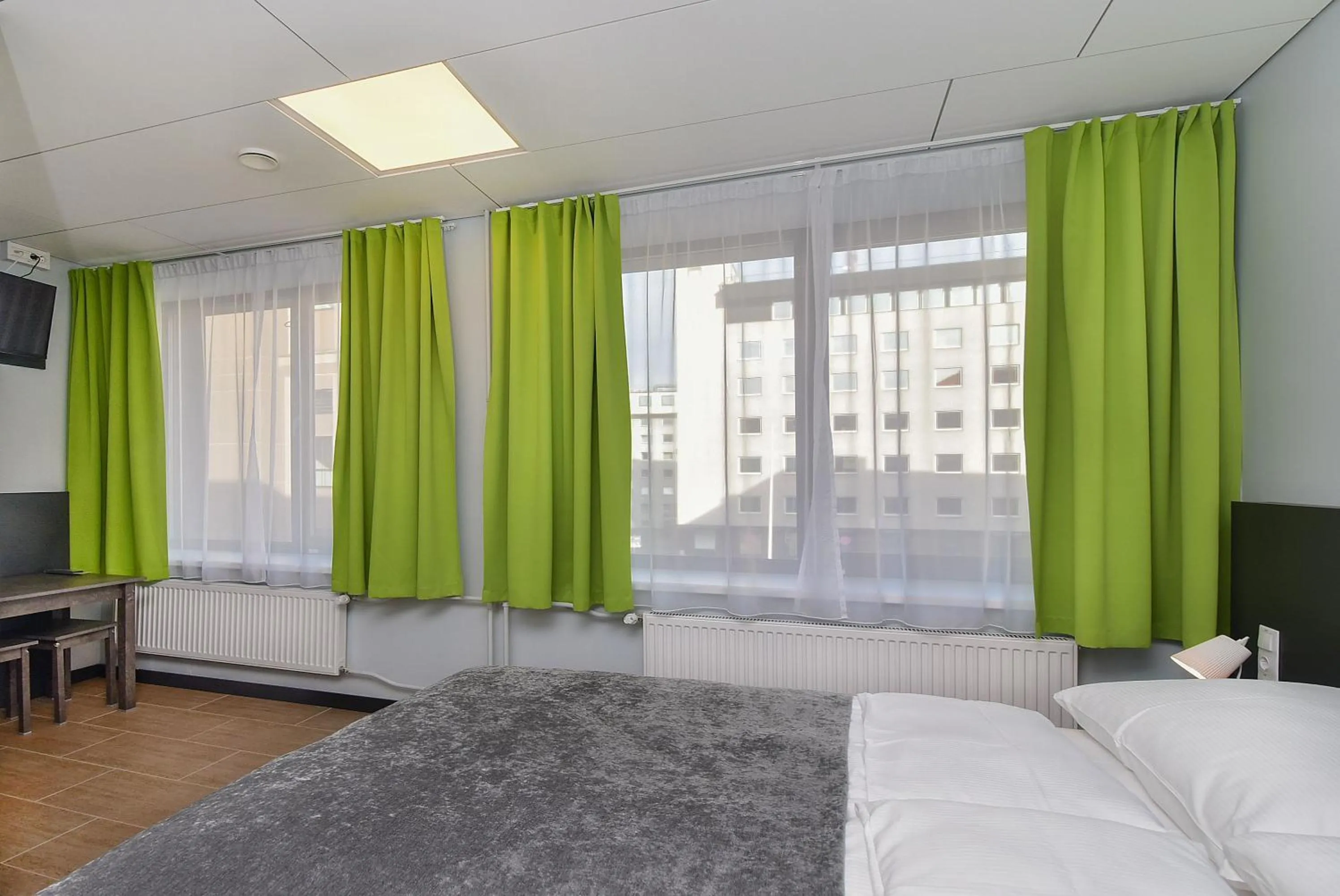 Photo of the whole room, Bed in City Yard Inn Hotel