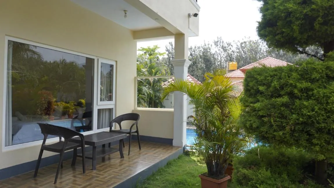 Deluxe Double Room with Balcony in Chirooss Homestays And Resorts