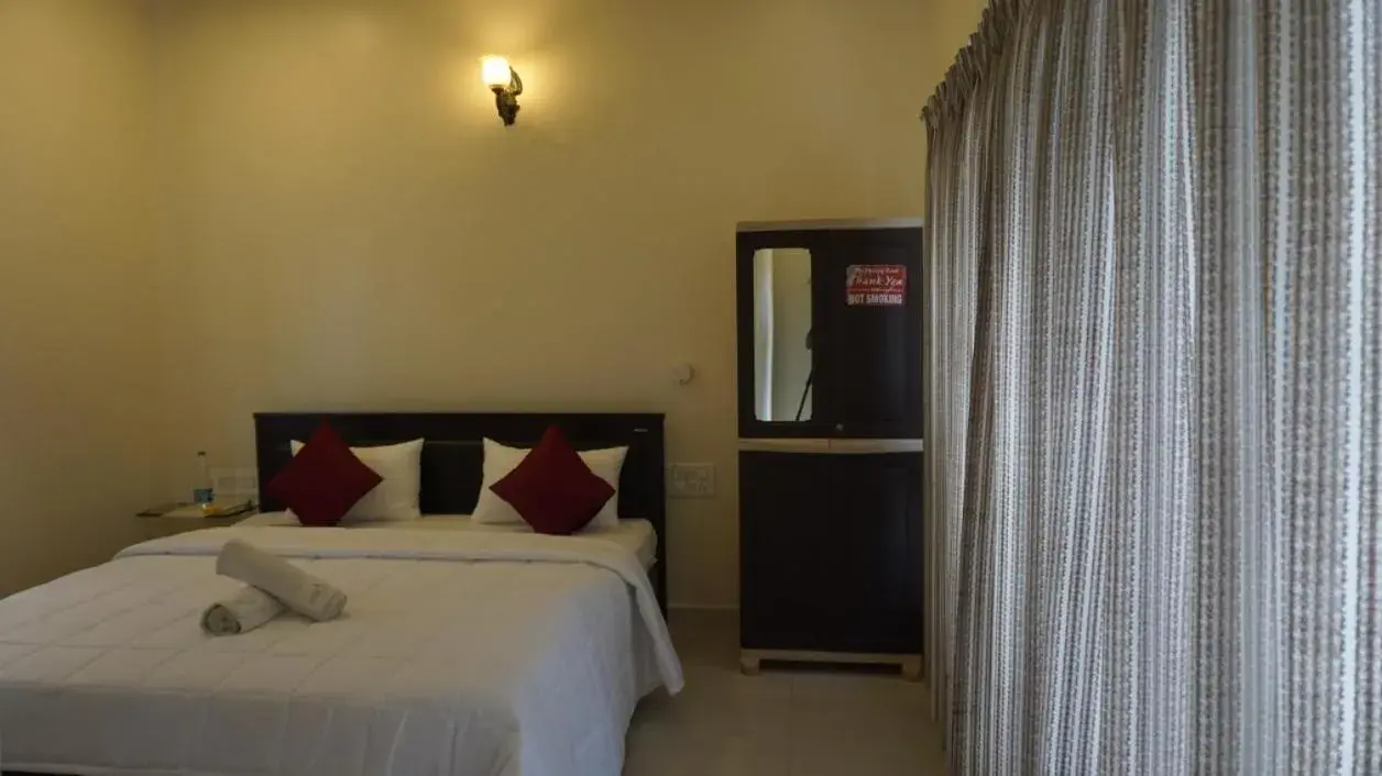 Deluxe Double Room with Balcony in Chirooss Homestays And Resorts Deluxe Double Room with Balcony in Chirooss Homestays And Resorts