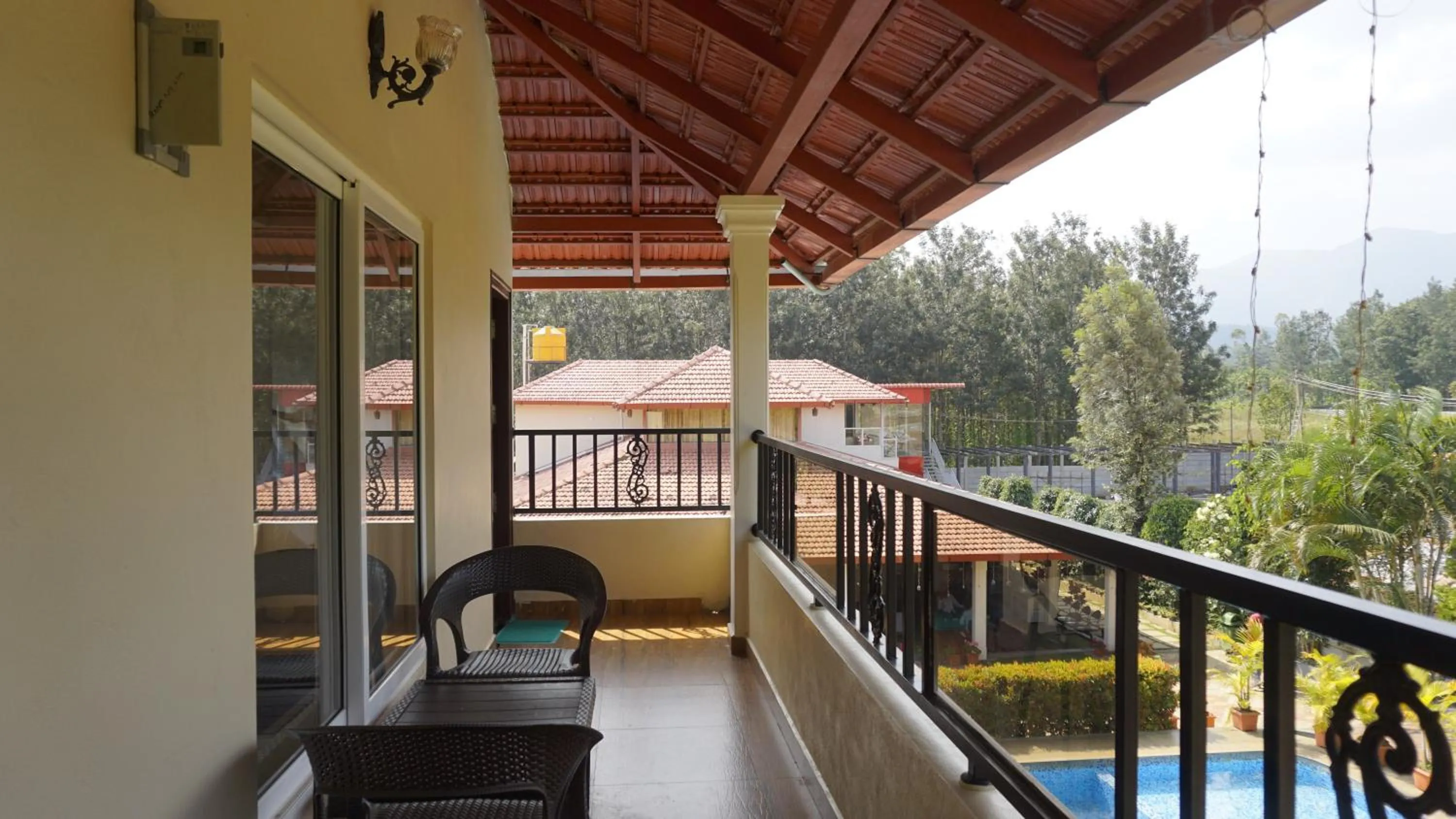 Triple Room with Balcony in Chirooss Homestays And Resorts