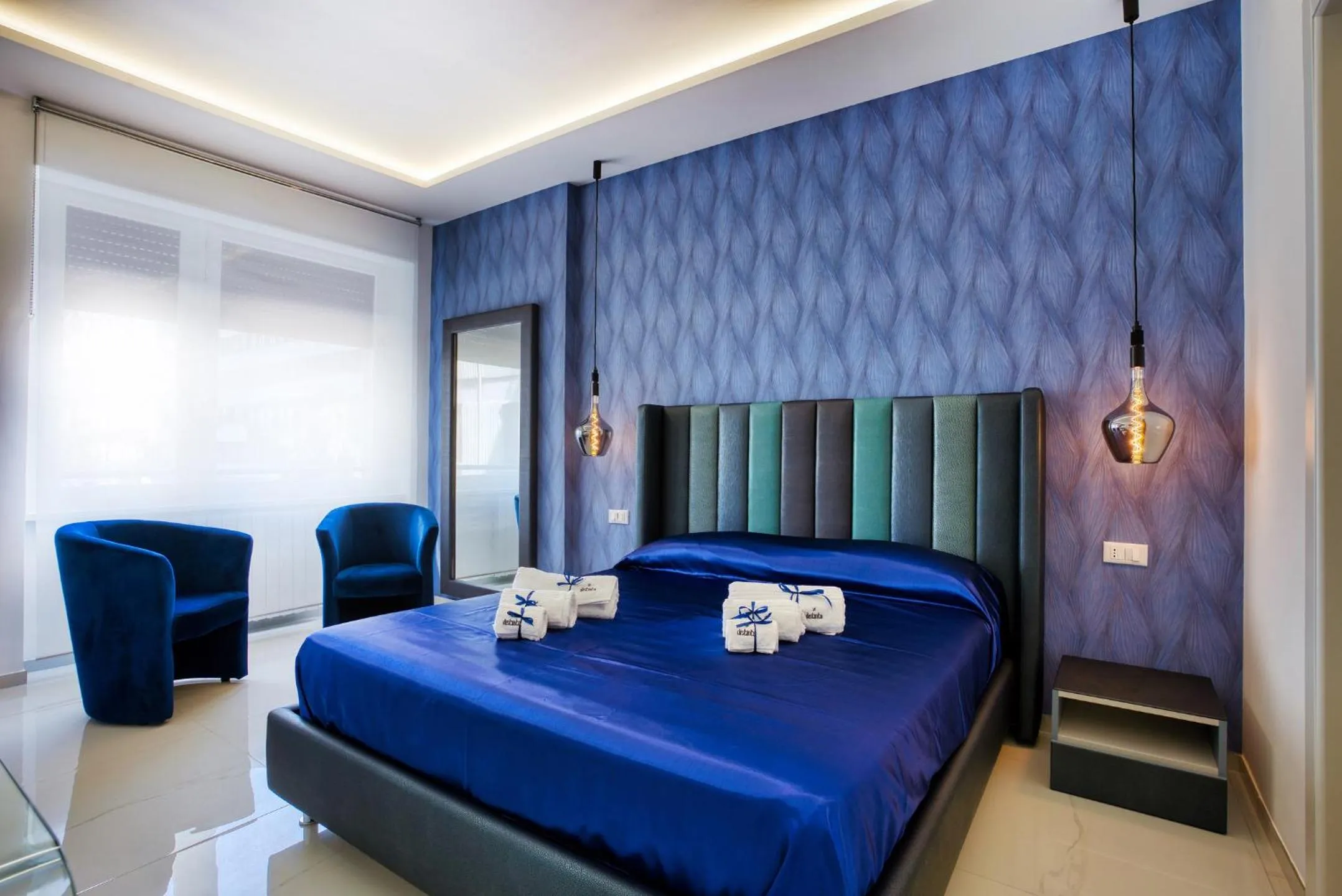 Bedroom, Bed in DISTINTO SUITE & ROOMS