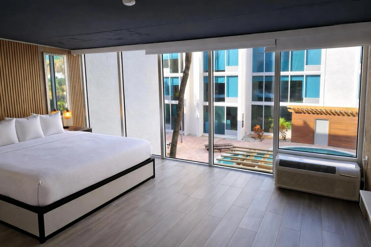 Bed in Tropical Palms Hotel