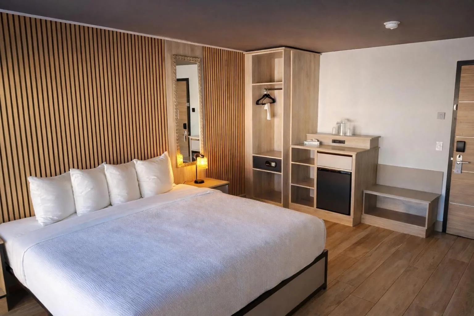 Bed in Tropical Palms Hotel